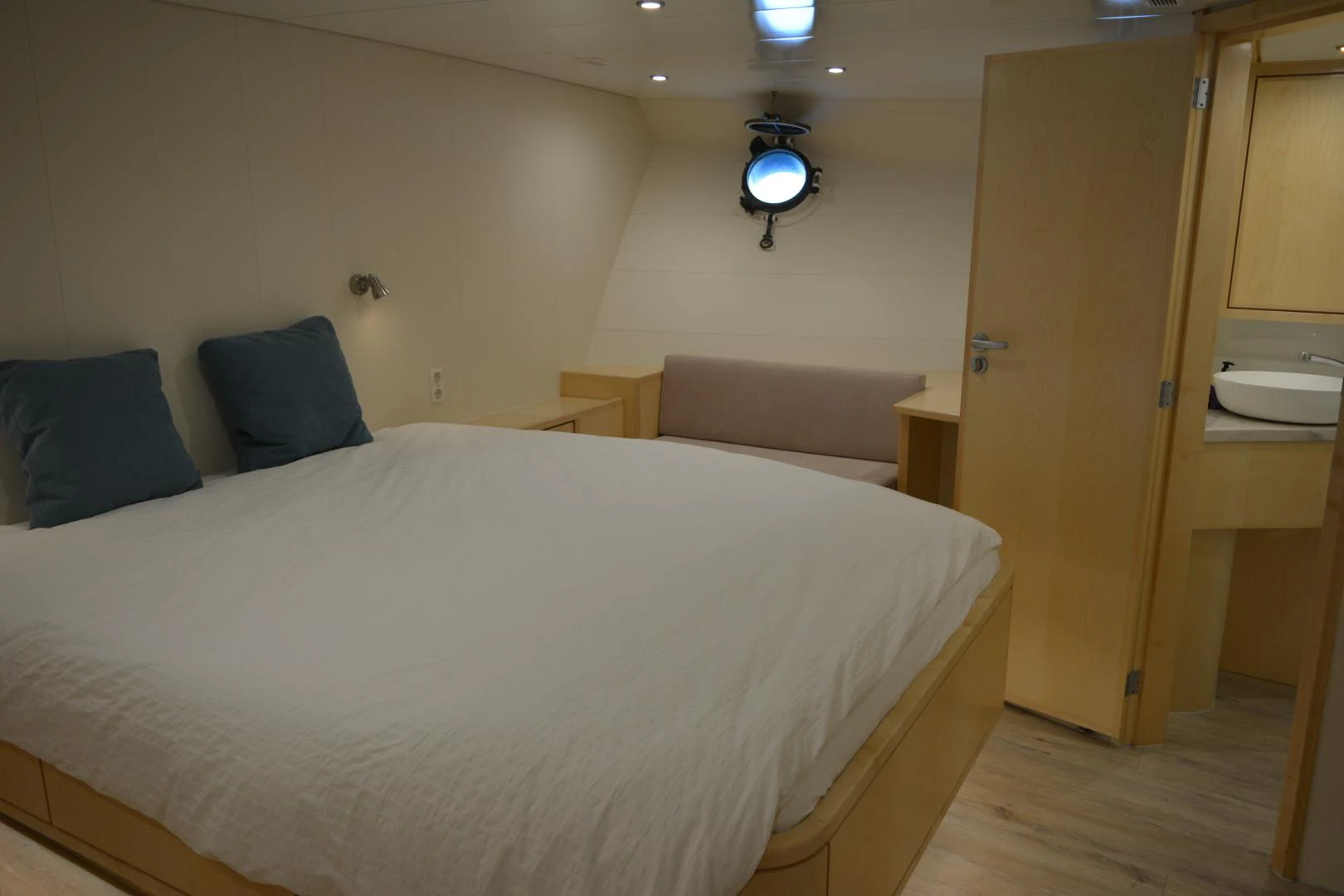 a bed in a room aboard ELENA Yacht for Sale