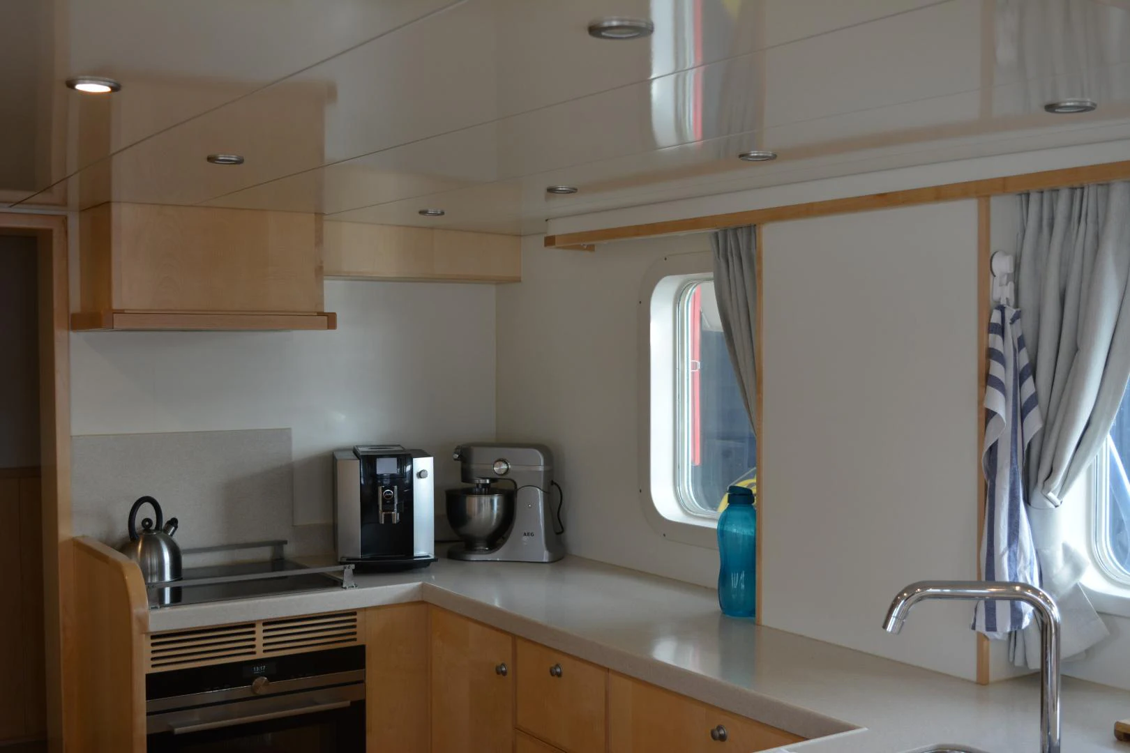 a kitchen with a sink and a window aboard ELENA Yacht for Sale