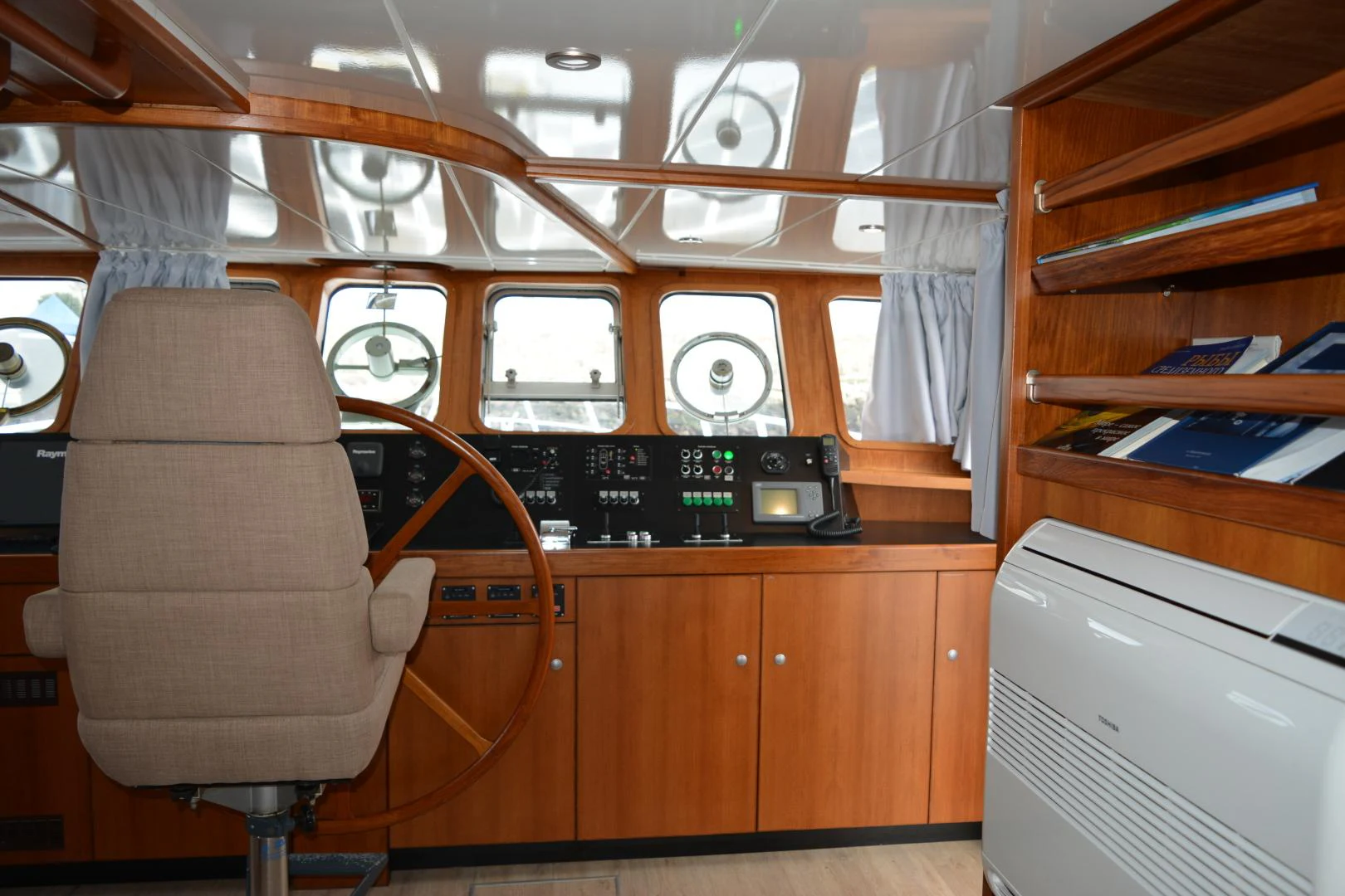 a room with a chair and a desk aboard ELENA Yacht for Sale