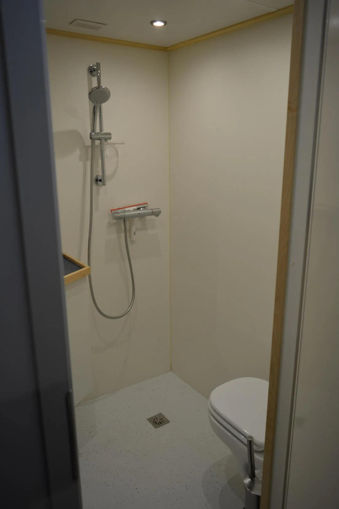 a bathroom with a shower and a toilet aboard ELENA Yacht for Sale
