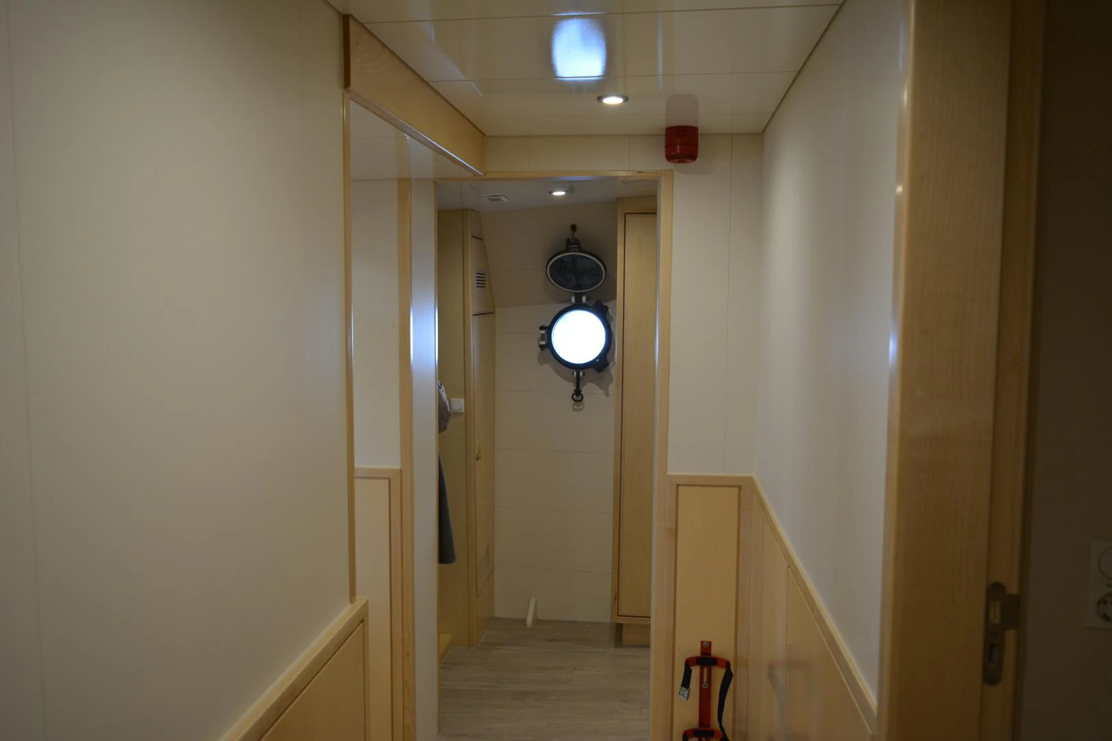 a hallway with a light on aboard ELENA Yacht for Sale