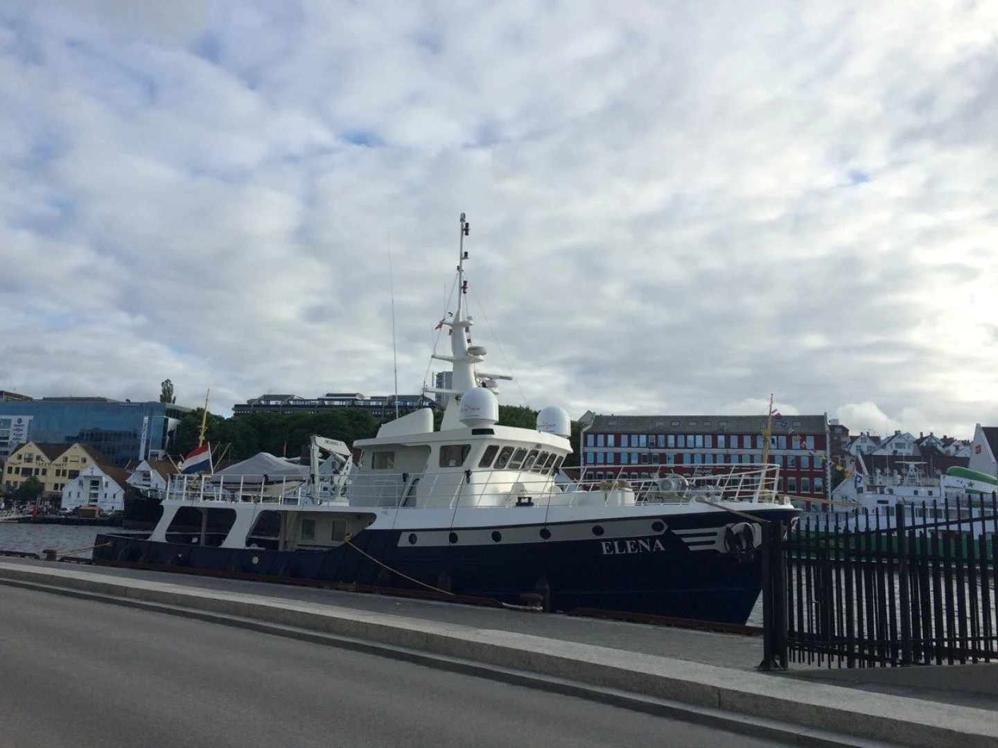 a boat docked at a pier aboard ELENA Yacht for Sale