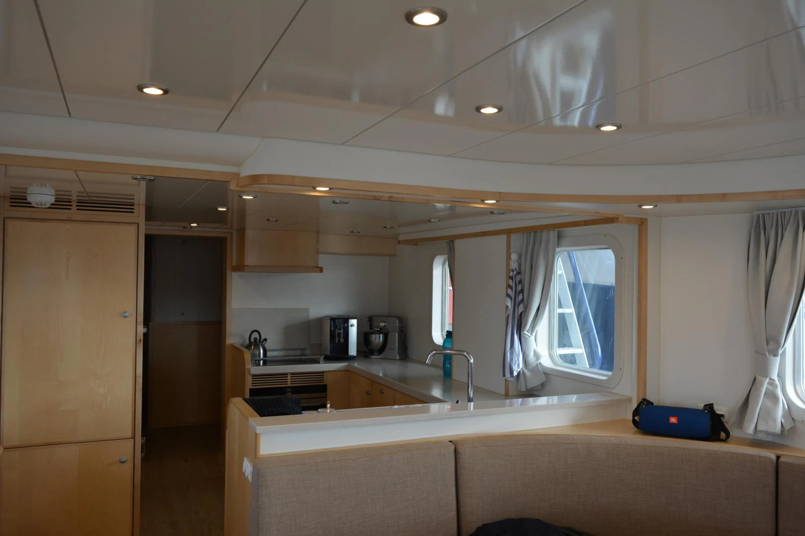 a kitchen with a sink and cabinets aboard ELENA Yacht for Sale