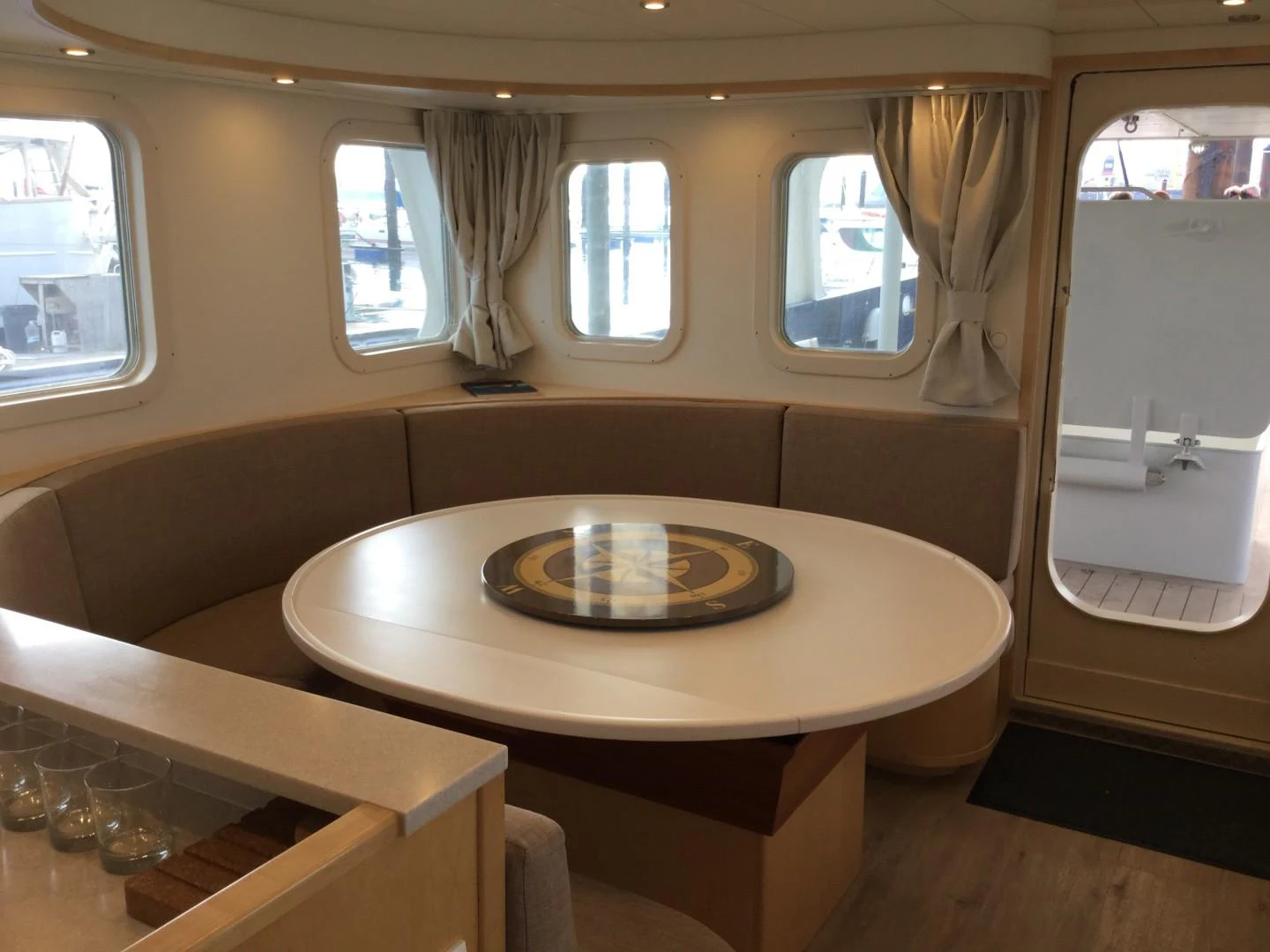 a table with a plate on it aboard ELENA Yacht for Sale