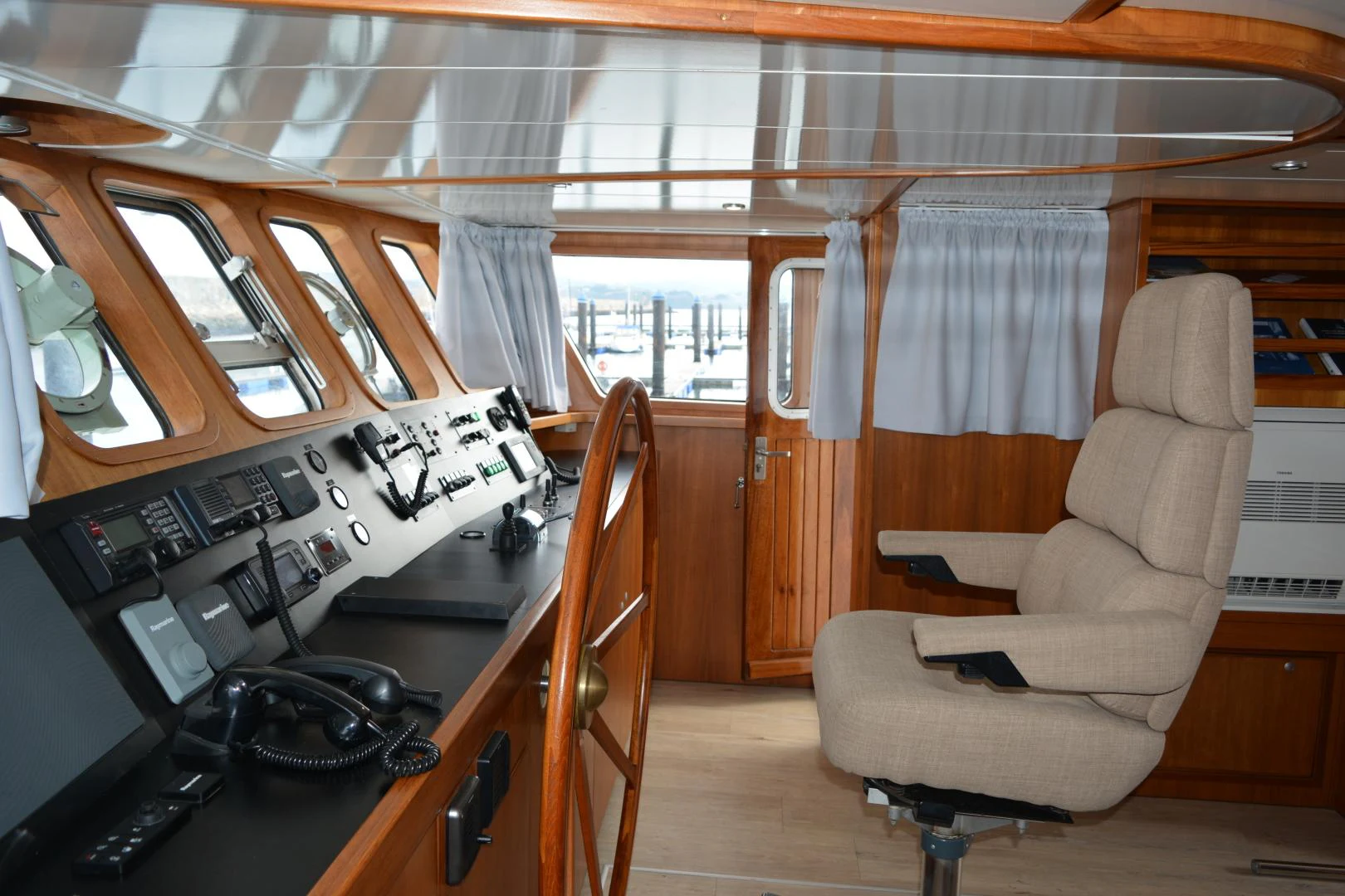 a room with a chair and a desk aboard ELENA Yacht for Sale