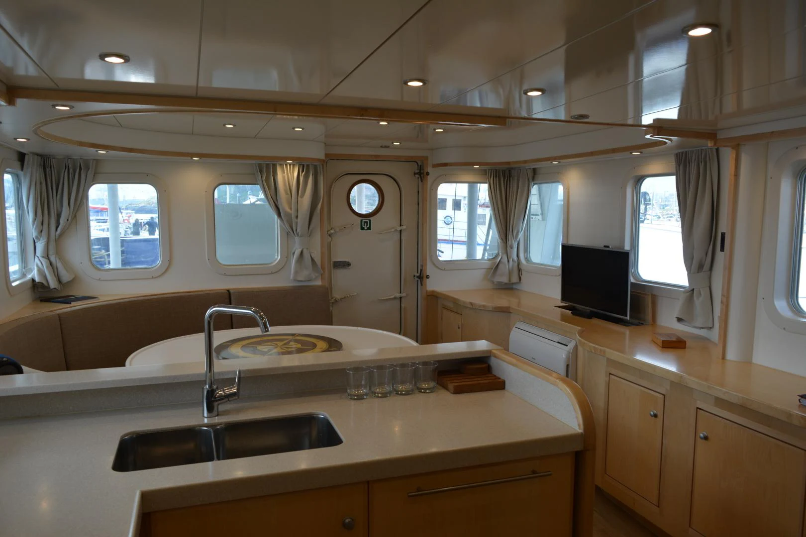 a kitchen with a sink and a microwave aboard ELENA Yacht for Sale