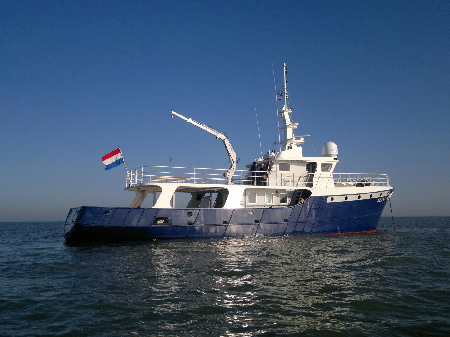 a large boat in the water aboard ELENA Yacht for Sale