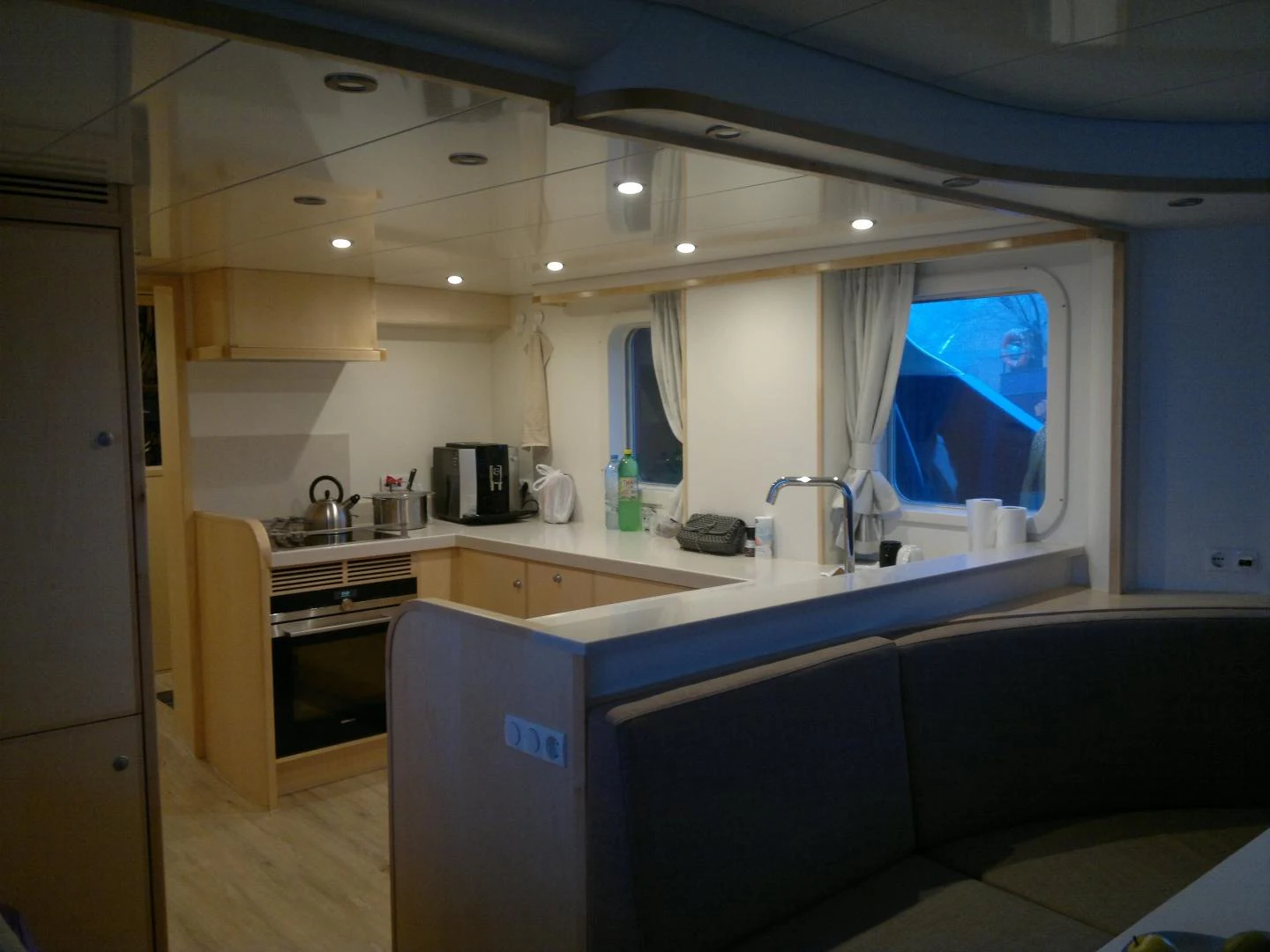 a kitchen with a sink and cabinets aboard ELENA Yacht for Sale