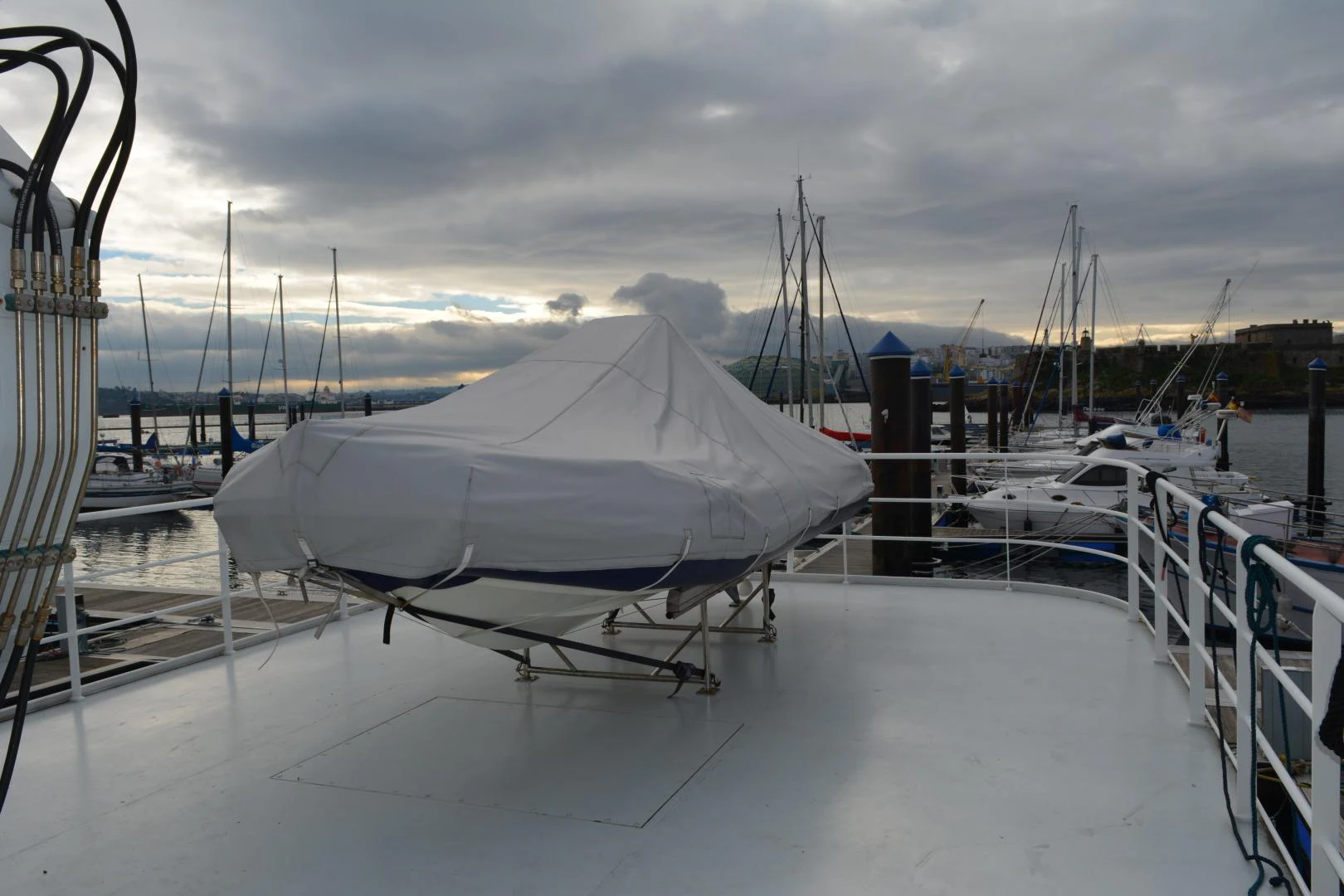 a snow covered dock with boats aboard ELENA Yacht for Sale