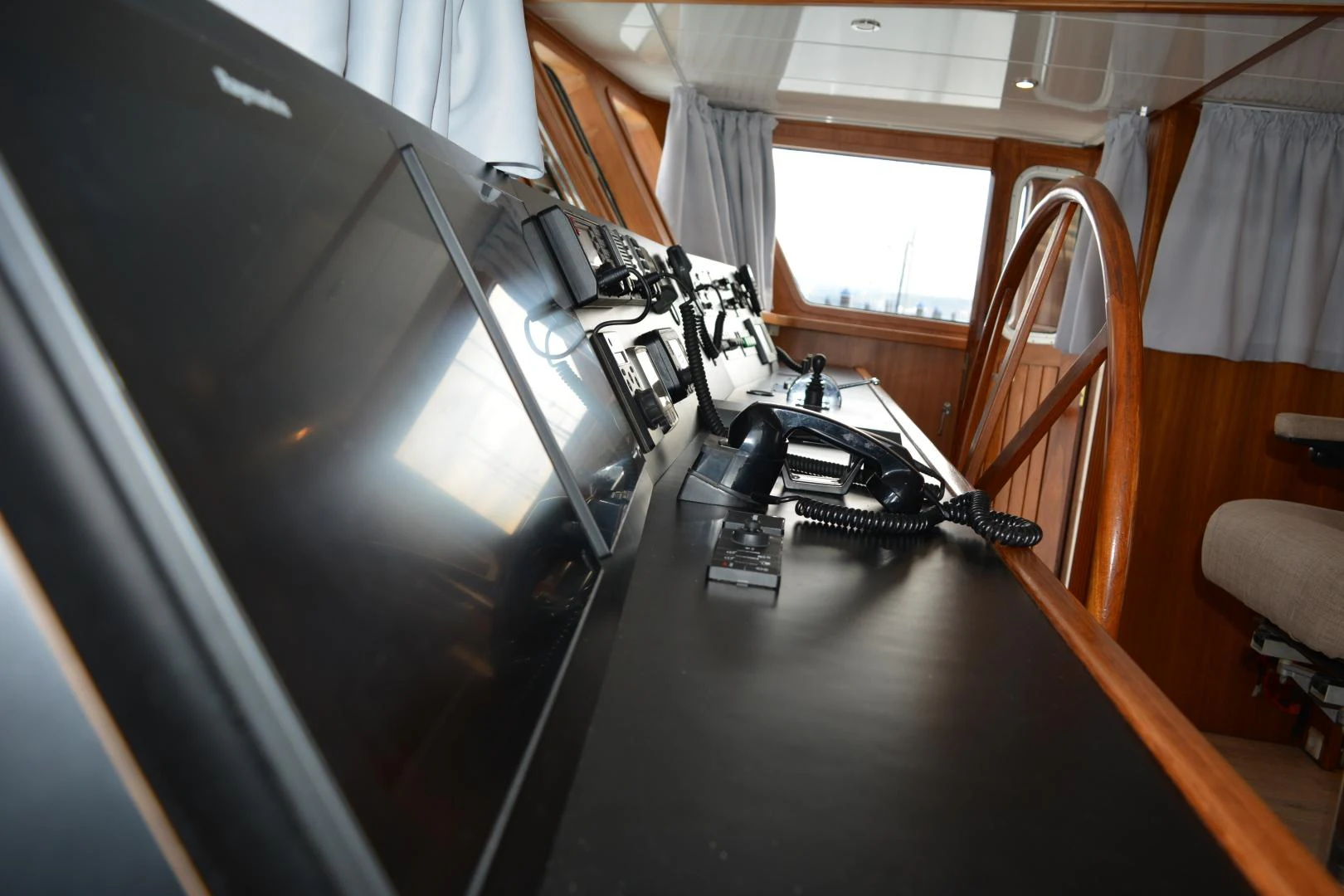 a black camera on a table aboard ELENA Yacht for Sale