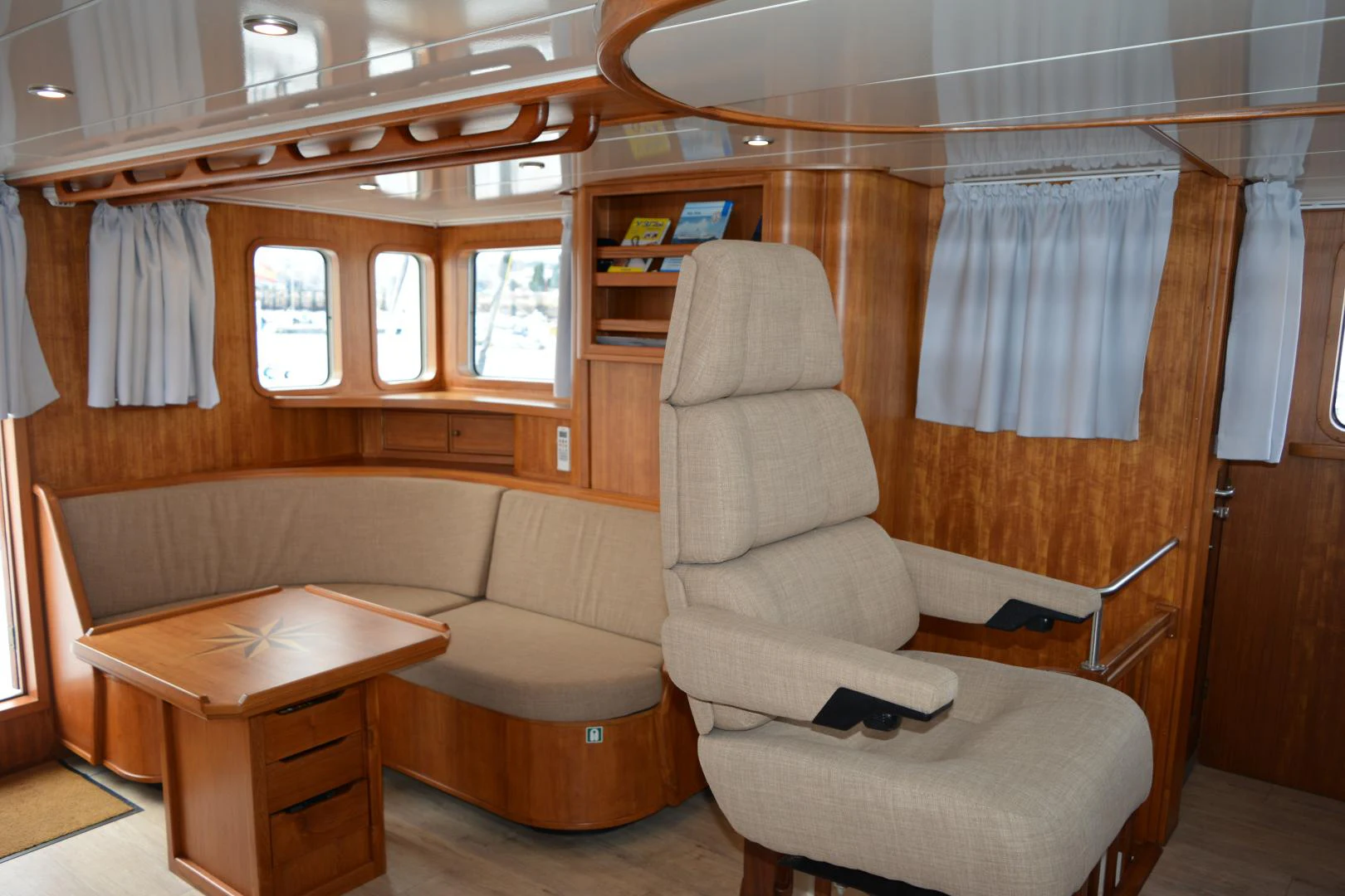 a room with a couch and a table aboard ELENA Yacht for Sale