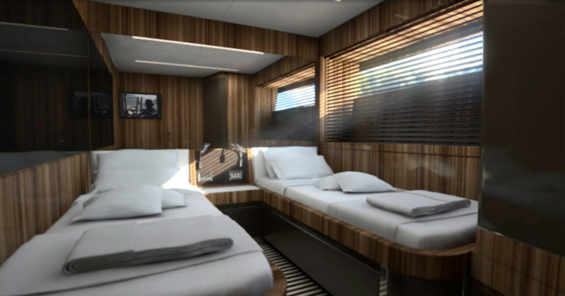 a room with two beds aboard SEDA Yacht for Sale