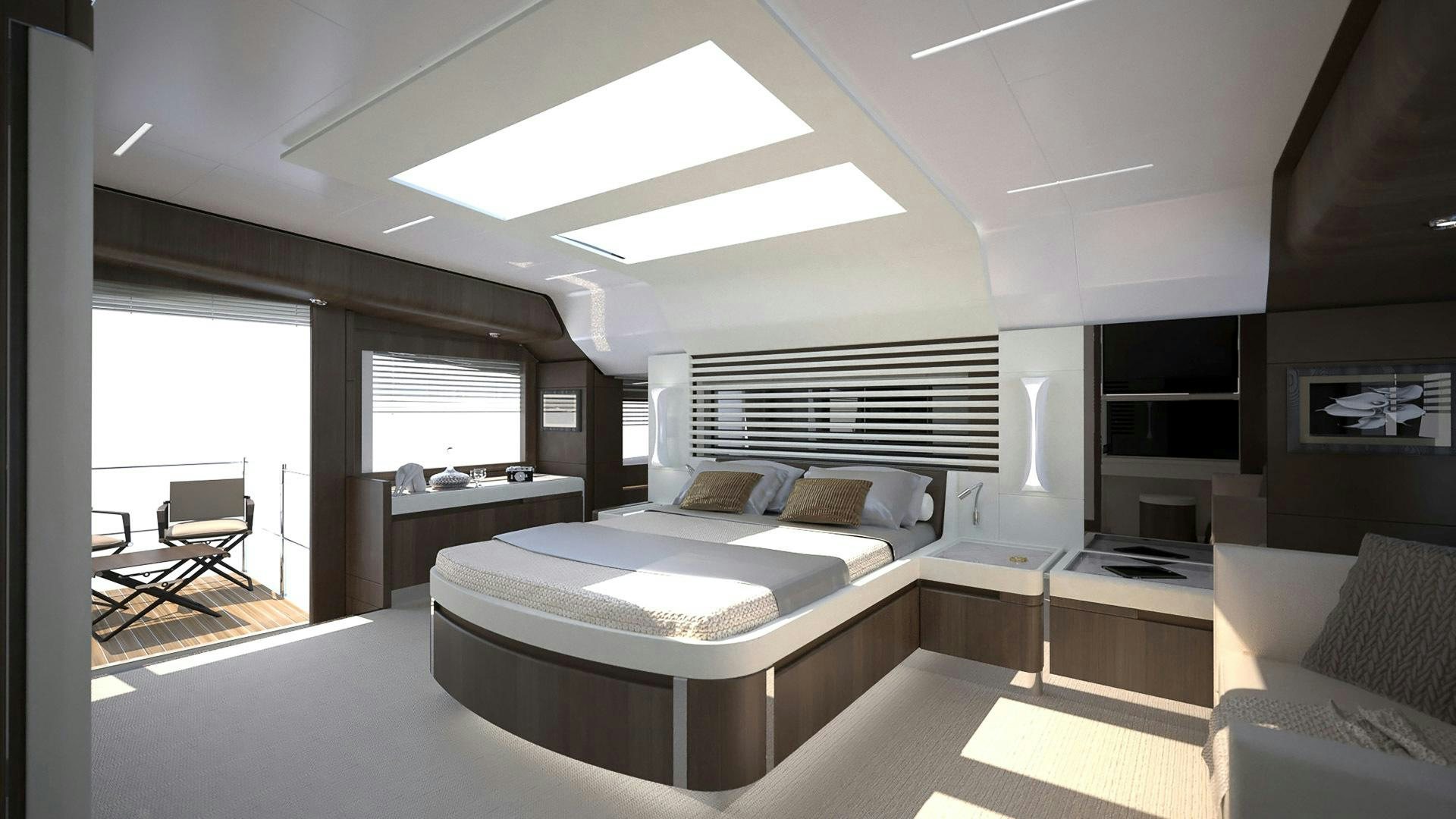 a bedroom with a bed and a desk aboard SEDA Yacht for Sale