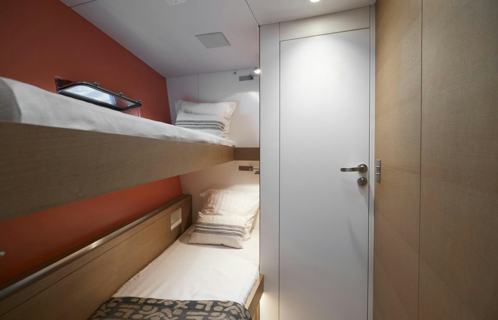 a room with two beds aboard CAPRICHO II Yacht for Sale