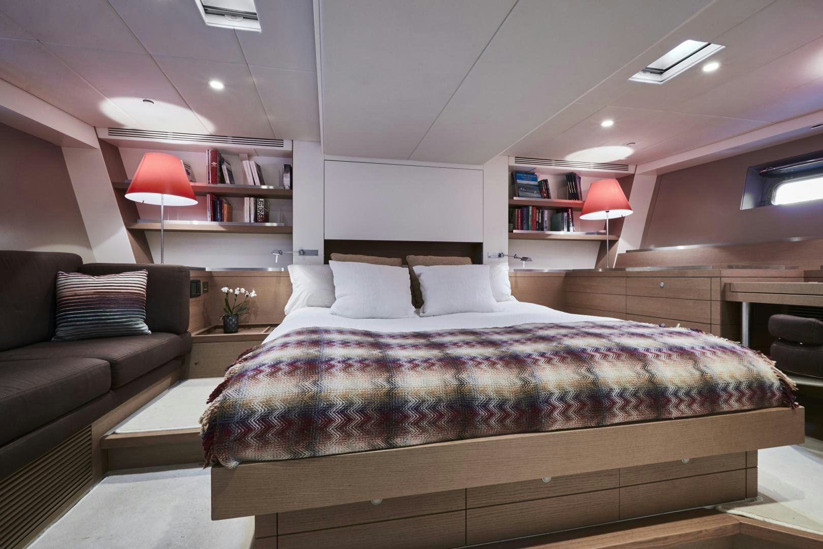 a bed in a room aboard CAPRICHO II Yacht for Sale