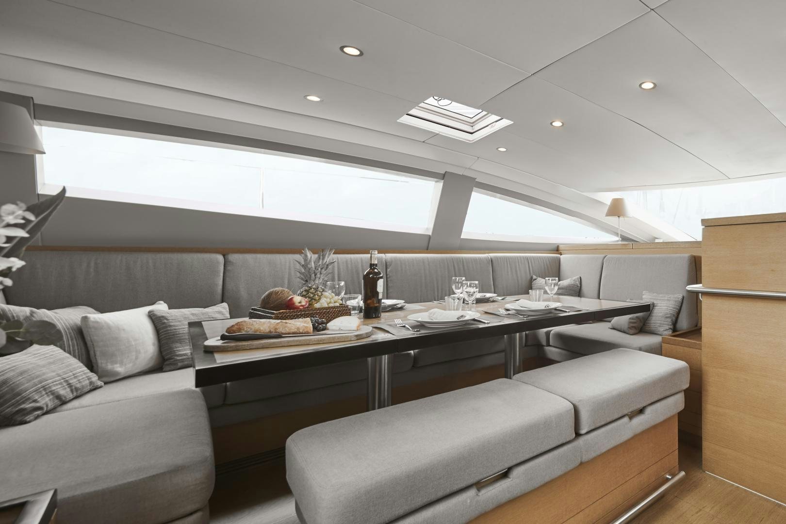 a modern looking living room aboard CAPRICHO II Yacht for Sale