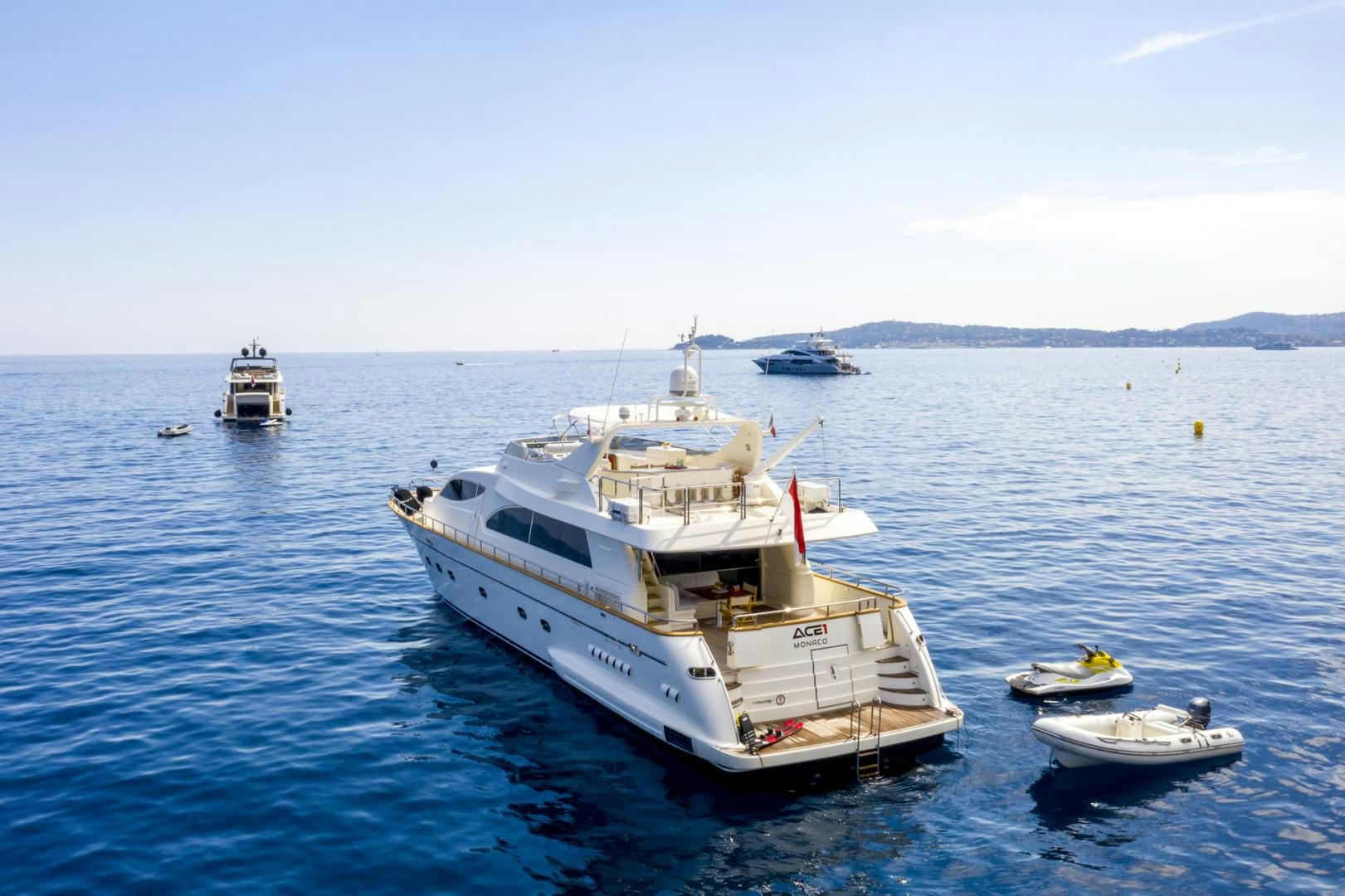 a group of boats in the water aboard ACE1 Yacht for Sale