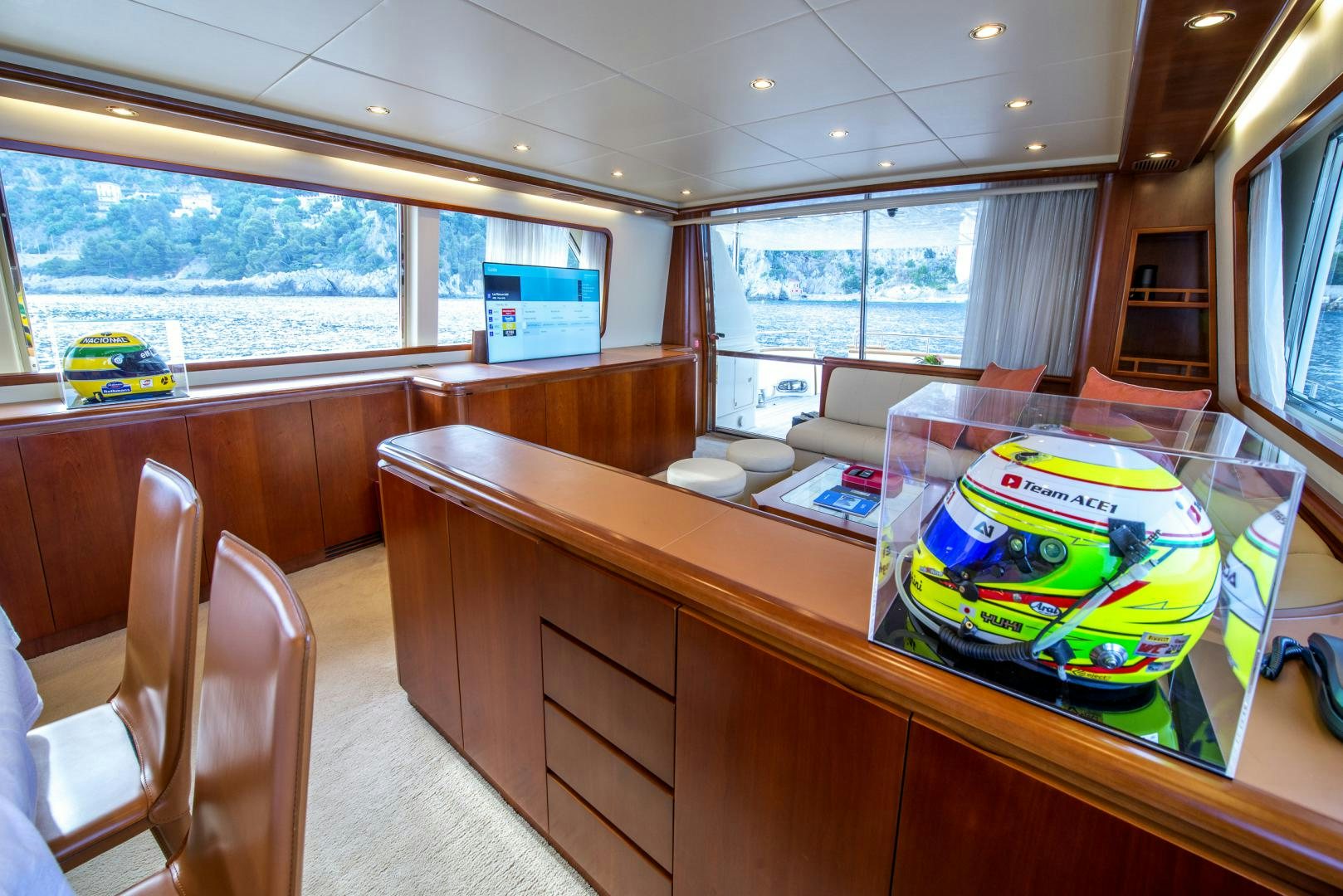 a kitchen with a table and chairs aboard ACE1 Yacht for Sale