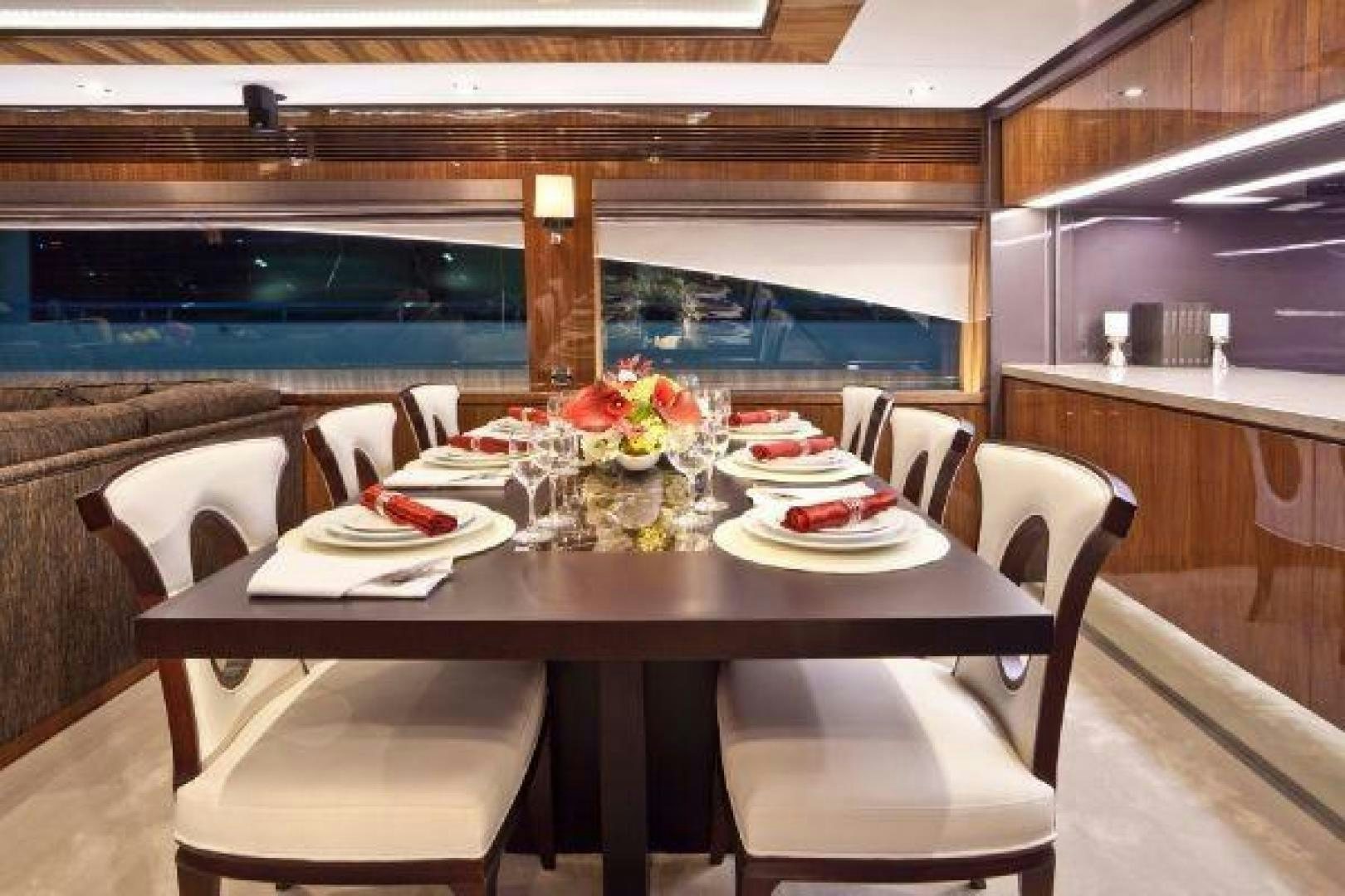 a table set for a meal aboard LUCKY DOG Yacht for Sale
