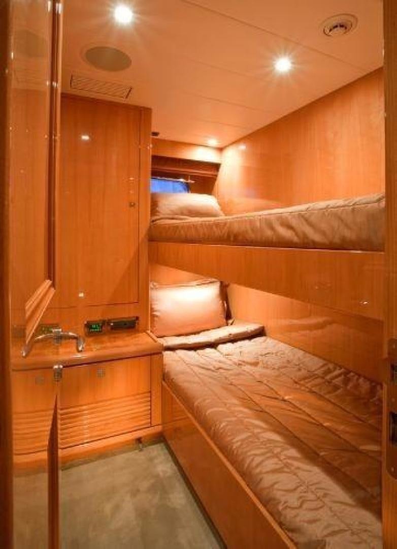 a room with bunk beds aboard LUCKY DOG Yacht for Sale
