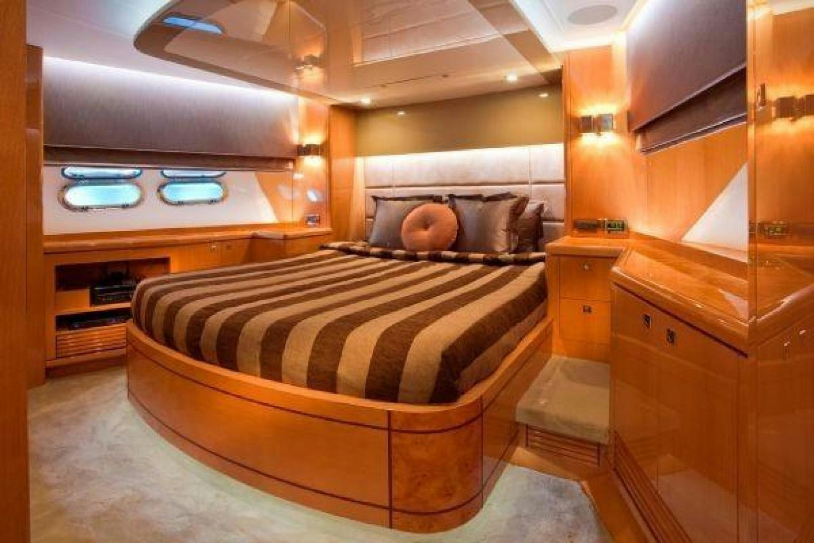 a bed in a room aboard LUCKY DOG Yacht for Sale