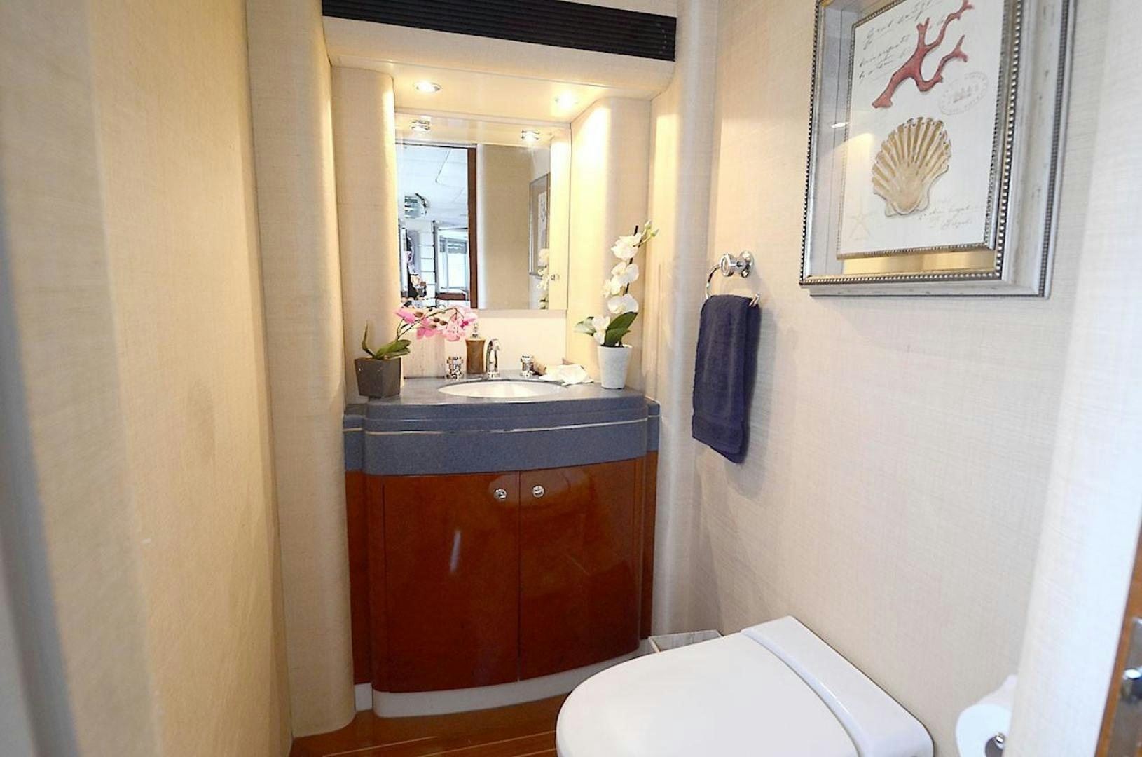 a bathroom with a sink and a mirror aboard ARTHUR'S WAY Yacht for Sale