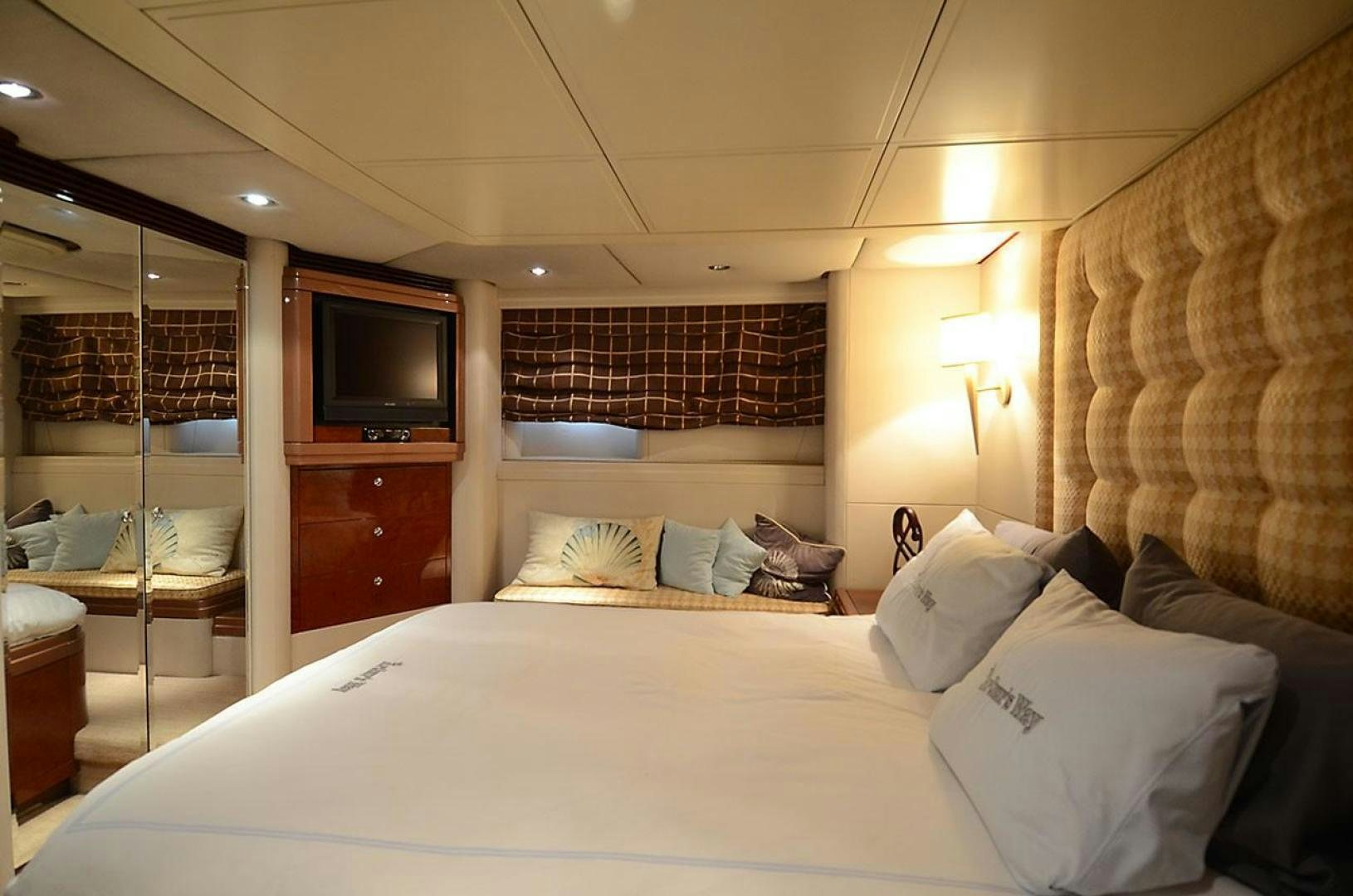 a hotel room with a bed and a tv aboard ARTHUR'S WAY Yacht for Sale