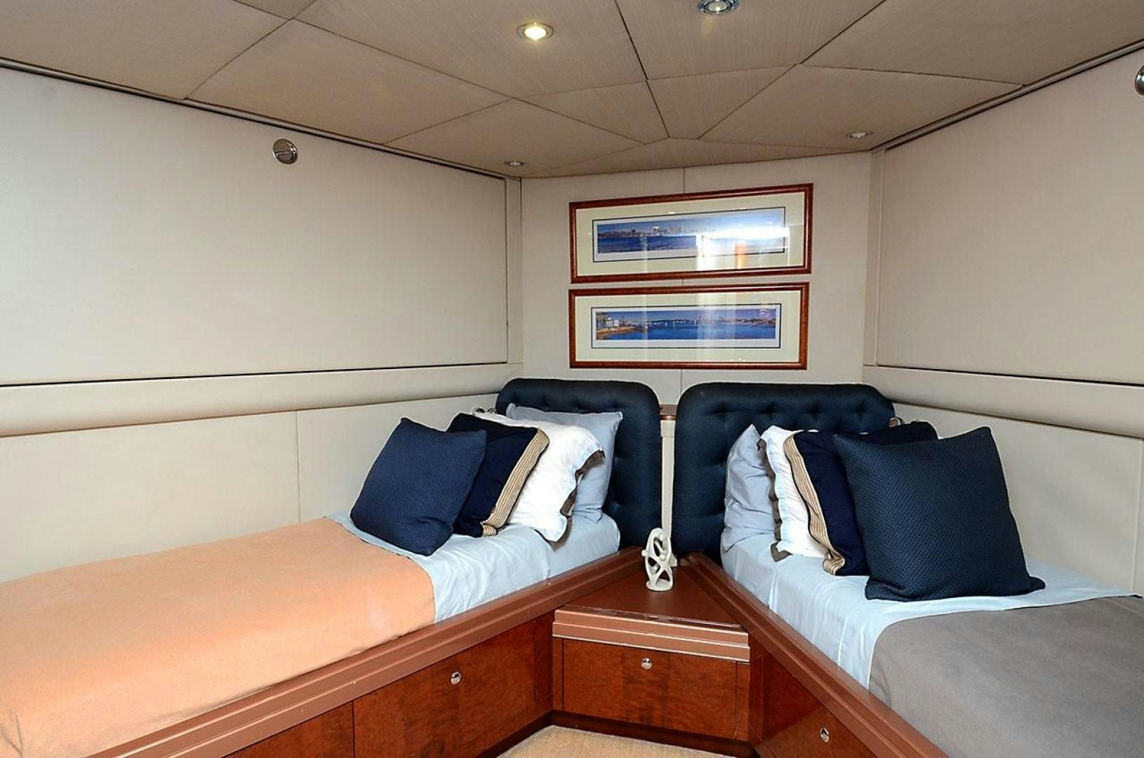 a room with a bed and a desk aboard ARTHUR'S WAY Yacht for Sale