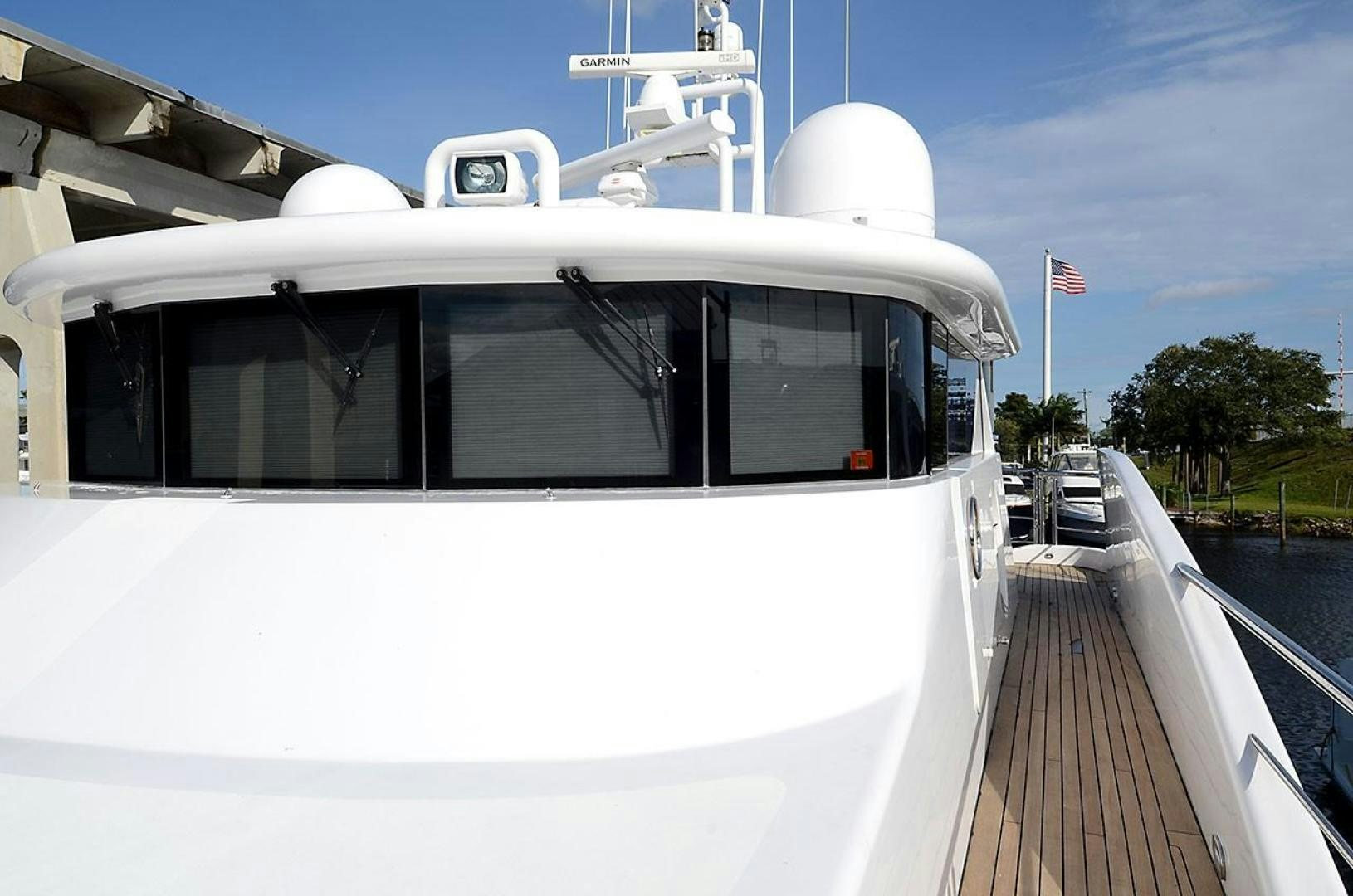 a white boat on a dock aboard ARTHUR'S WAY Yacht for Sale