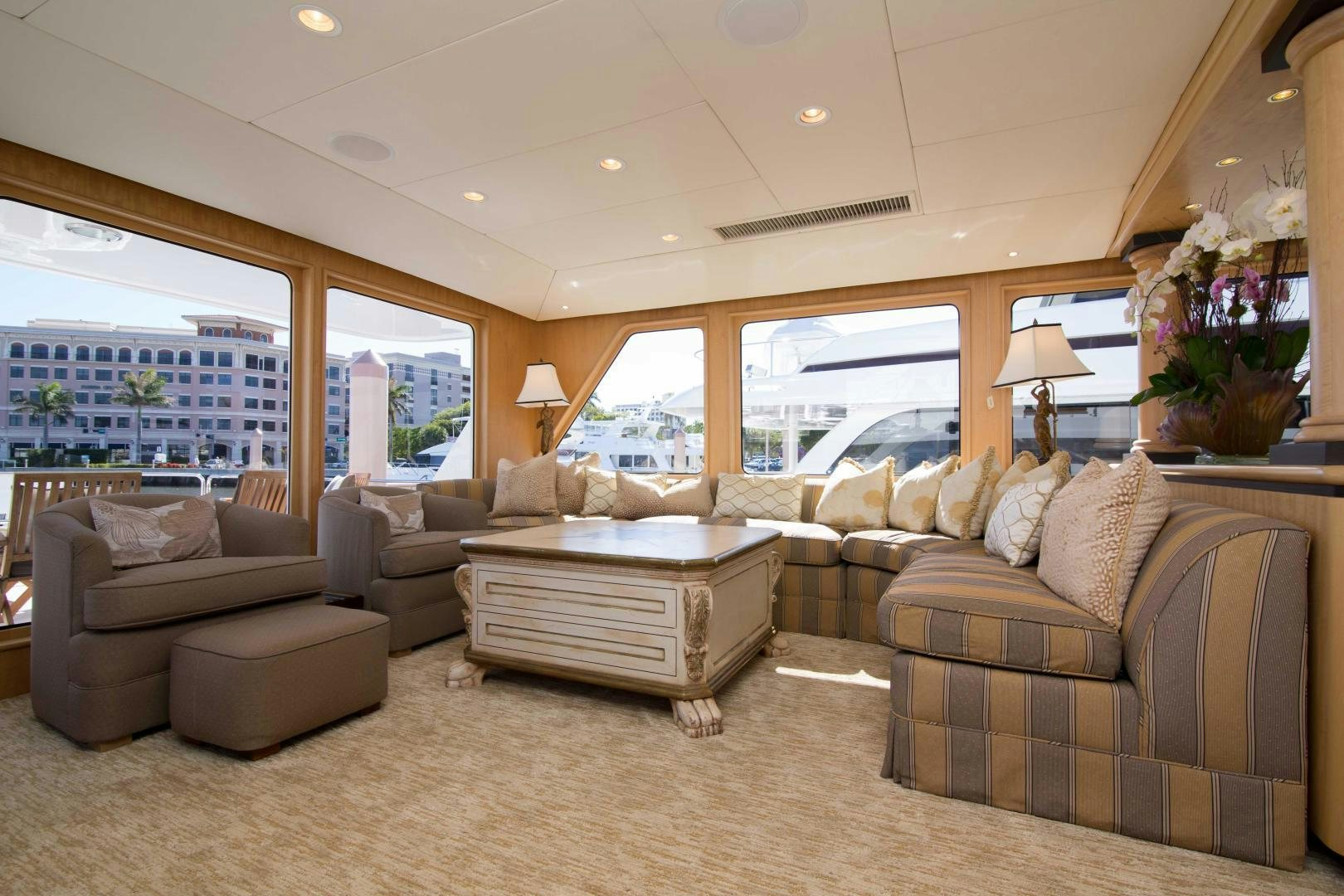 a living room with a large window aboard ROAMIN' HOLIDAY Yacht for Sale