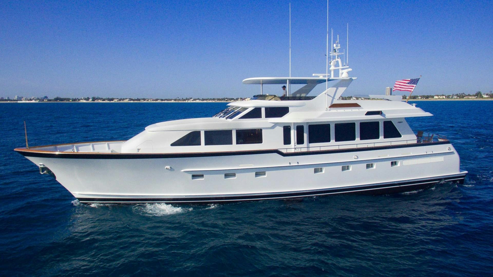 a white boat in the water aboard ROAMIN' HOLIDAY Yacht for Sale