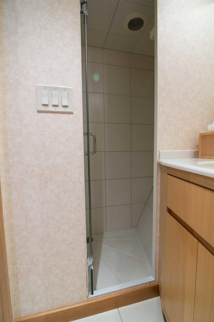 a shower unit in a bathroom aboard ROAMIN' HOLIDAY Yacht for Sale