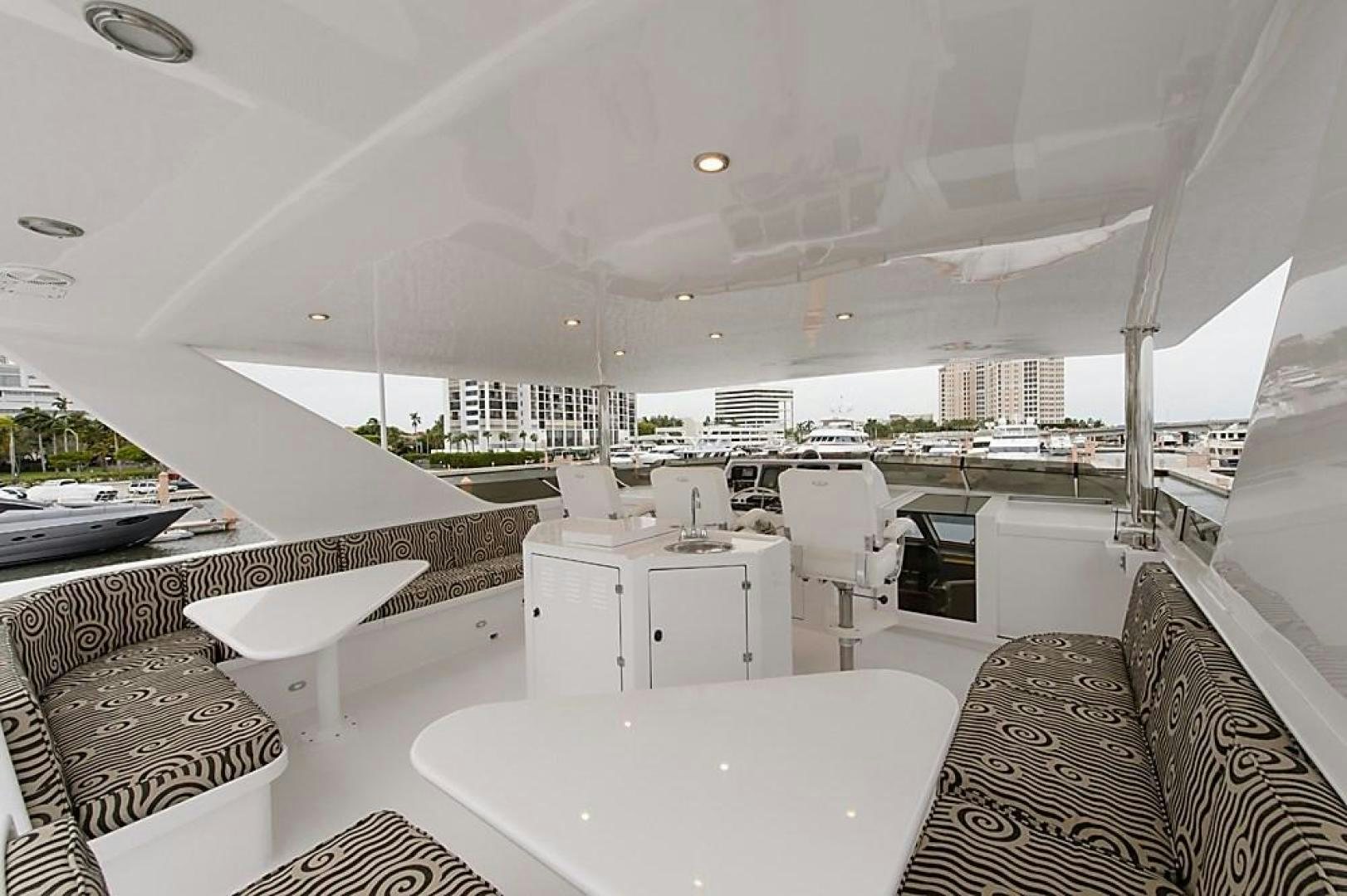 a room with a table and chairs aboard ROAMIN' HOLIDAY Yacht for Sale