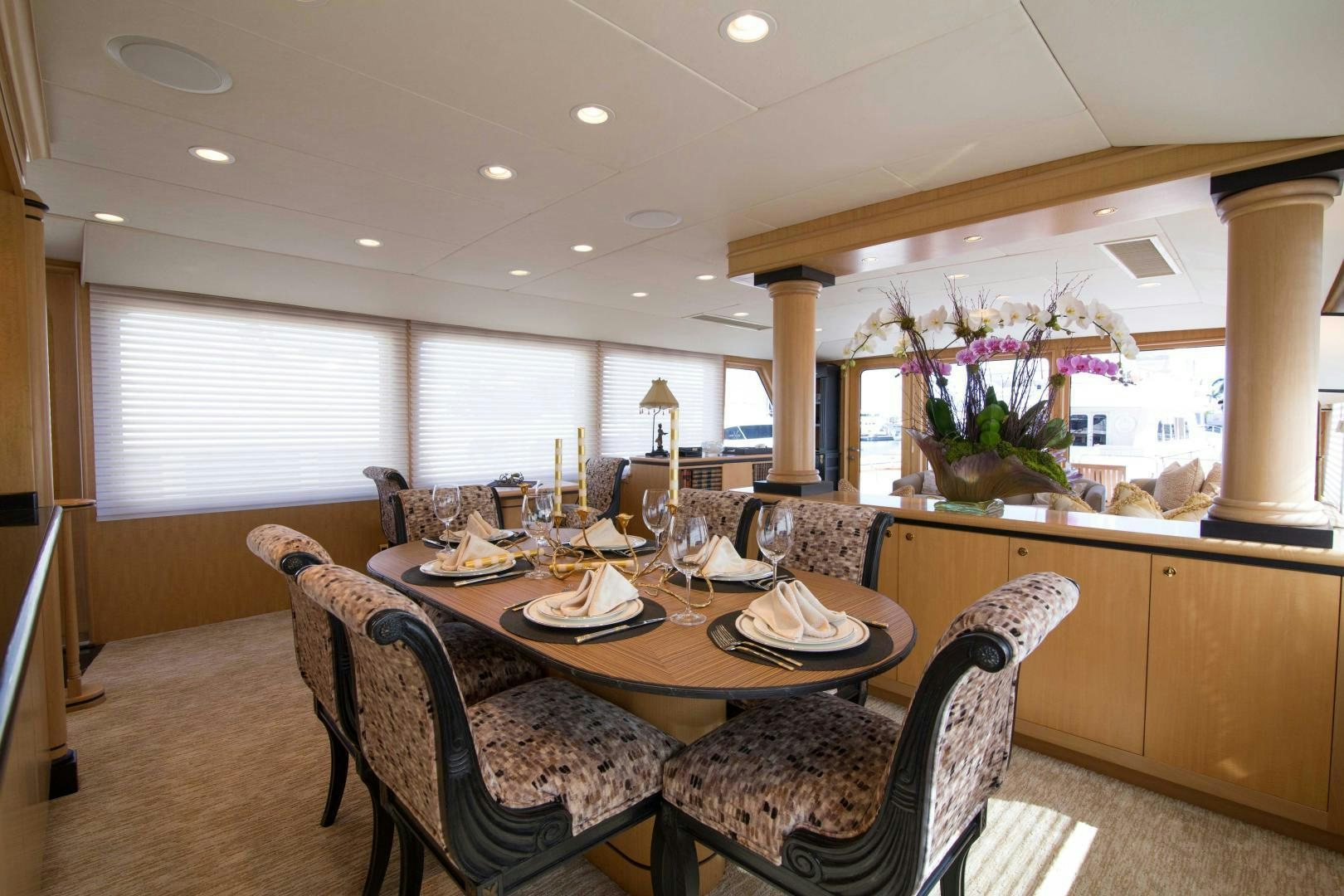 a dining room with a table and chairs aboard ROAMIN' HOLIDAY Yacht for Sale