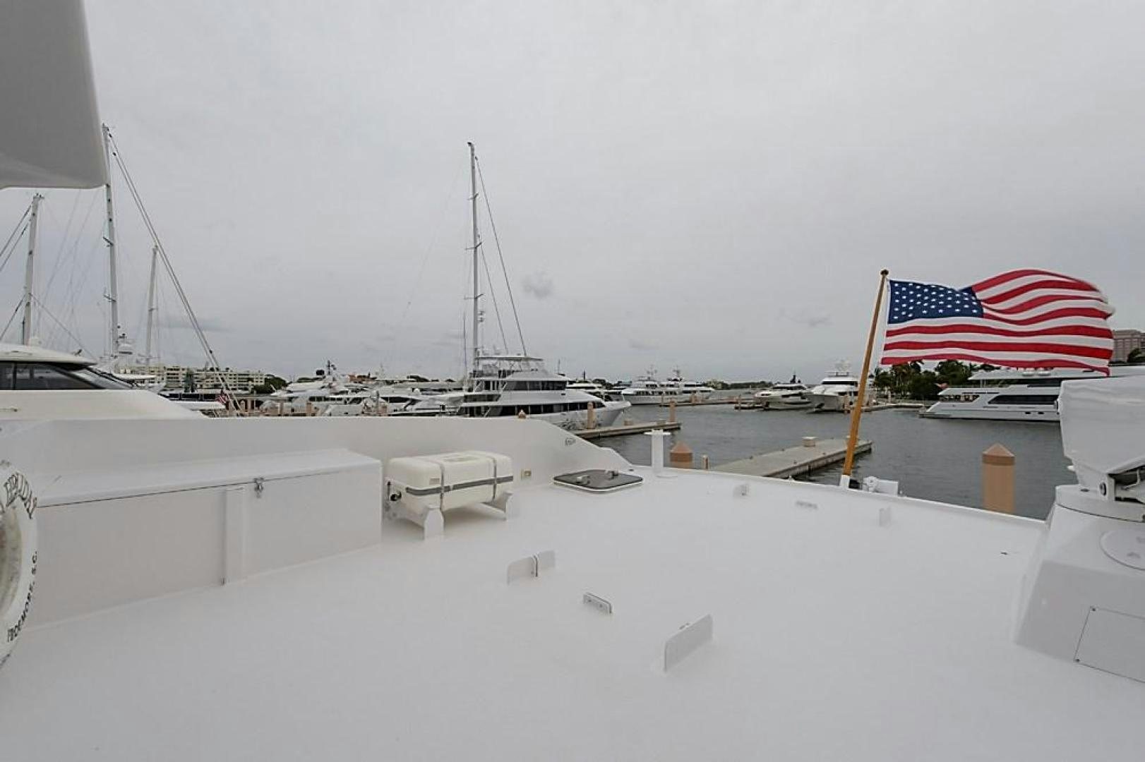 a flag on a pole in the snow aboard ROAMIN' HOLIDAY Yacht for Sale