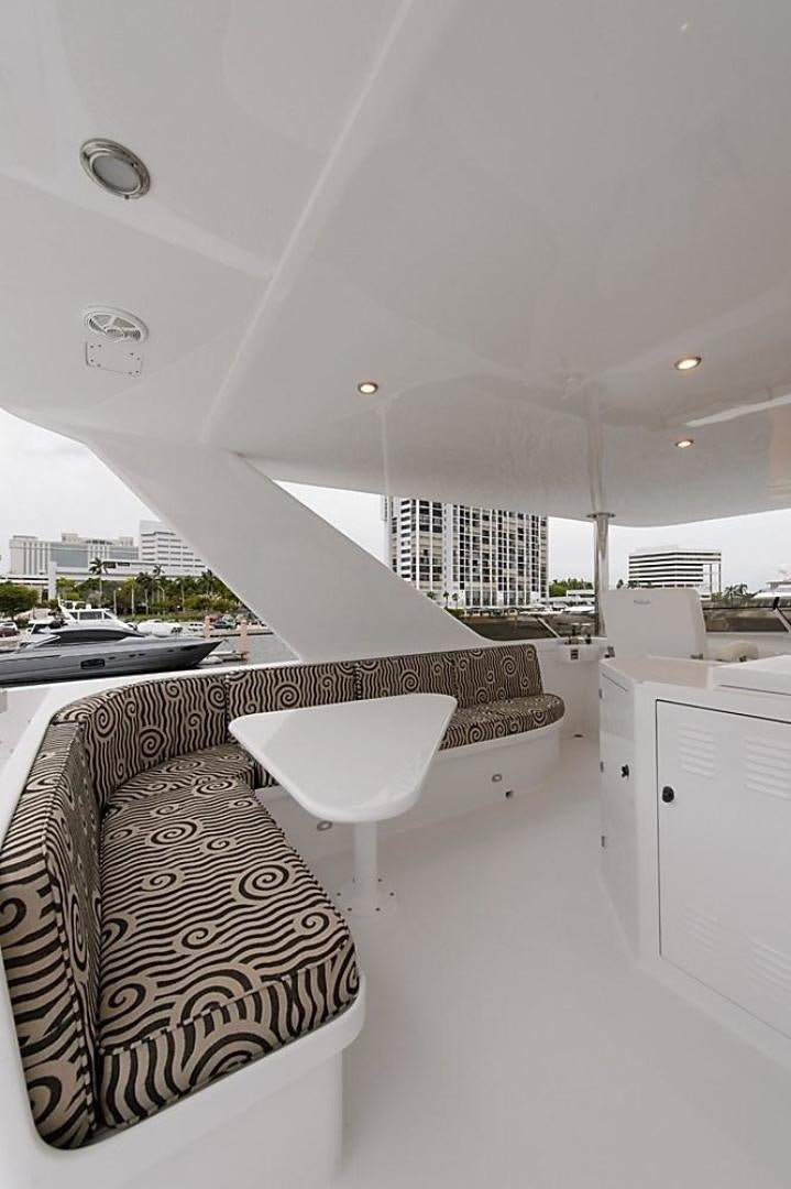 a room with a table and chairs aboard ROAMIN' HOLIDAY Yacht for Sale