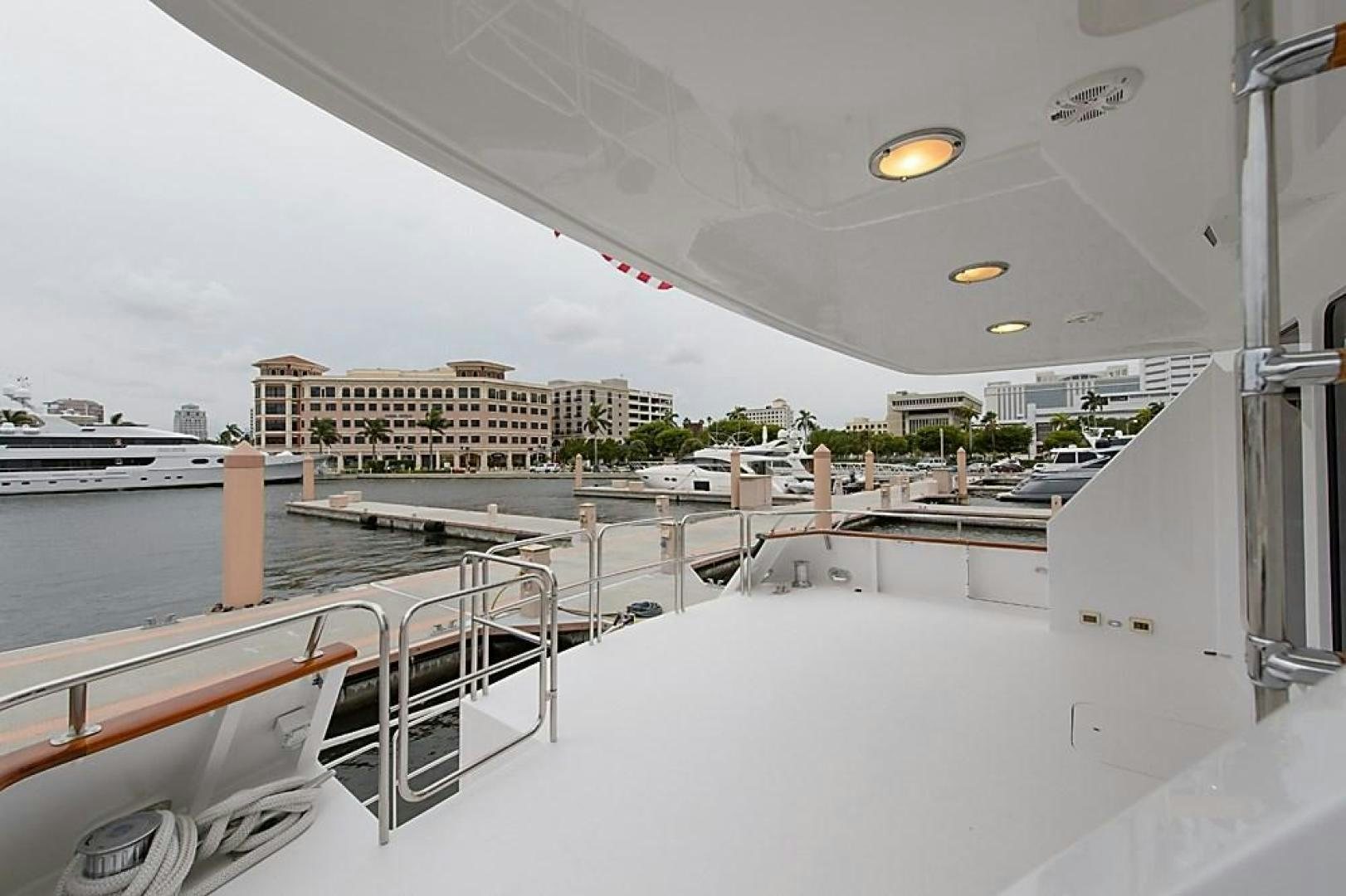 a large white boat in a large body of water aboard ROAMIN' HOLIDAY Yacht for Sale