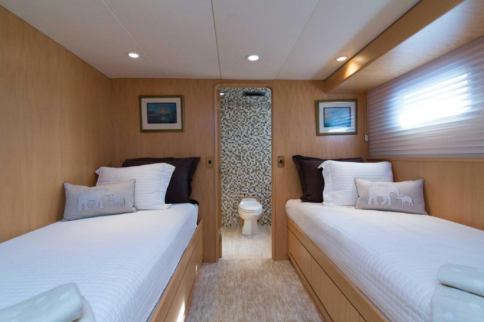 a room with two beds aboard ROAMIN' HOLIDAY Yacht for Sale
