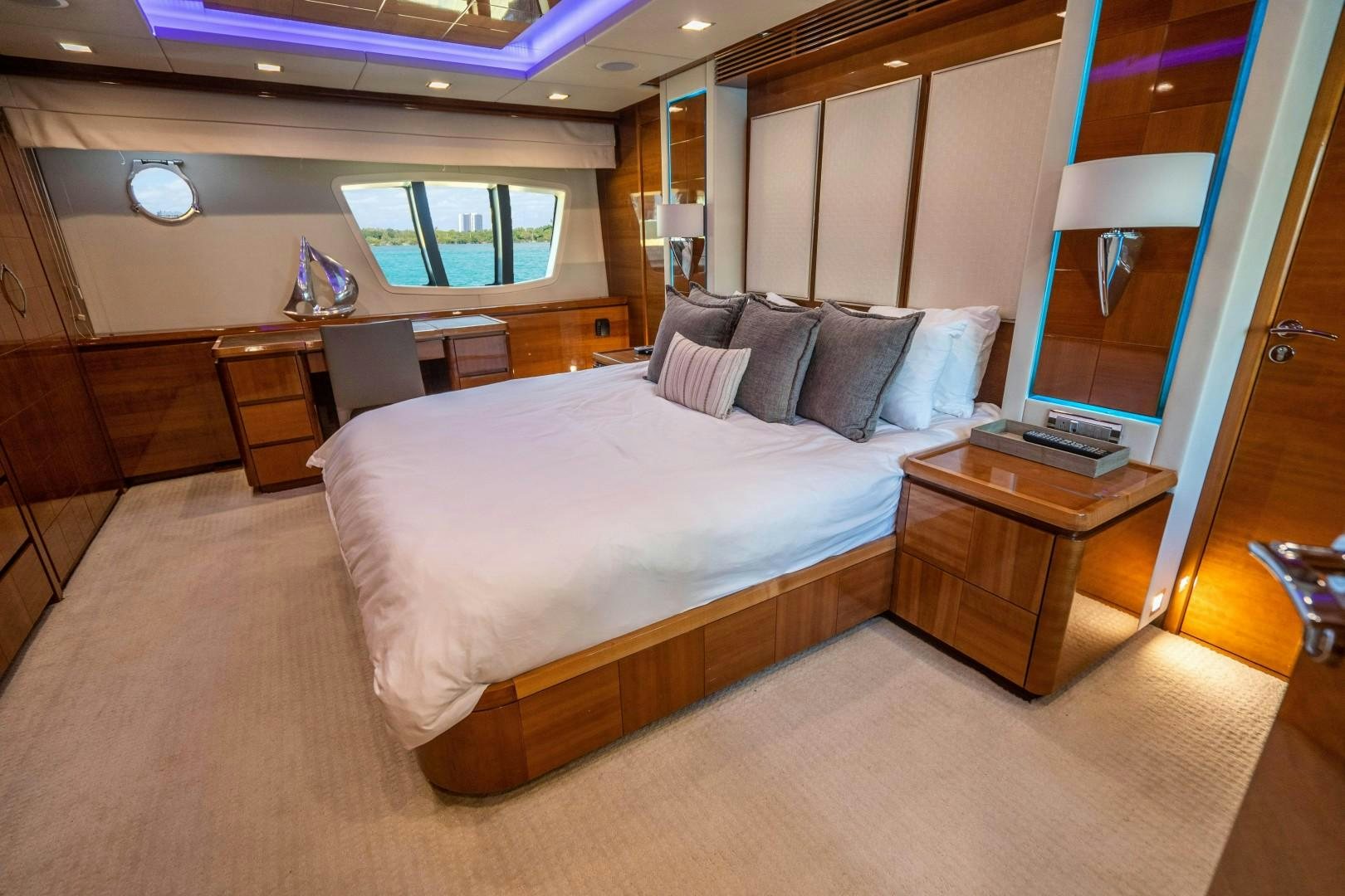 a bed in a room aboard Blue Yacht for Sale