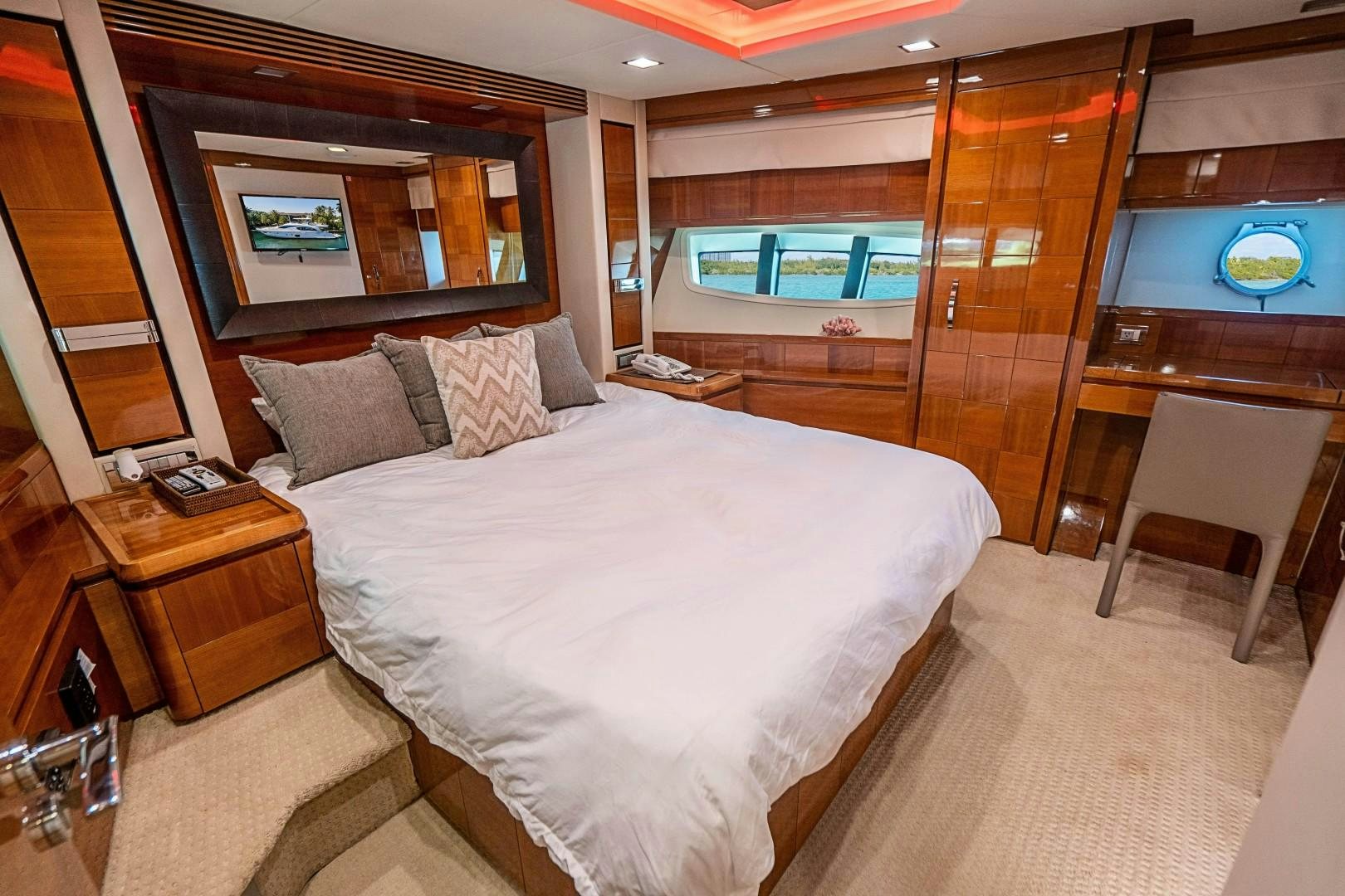 a bed in a room aboard Blue Yacht for Sale