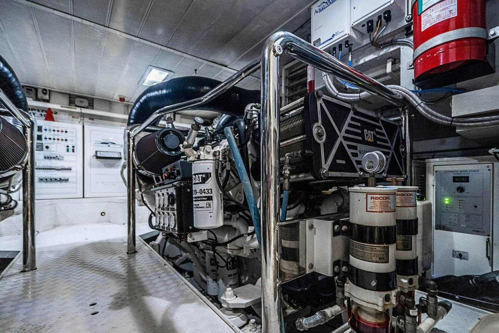 a large machine inside a building aboard Blue Yacht for Sale