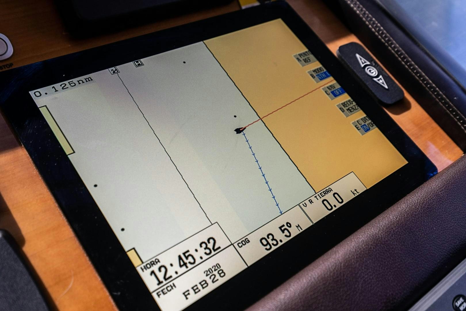 a tablet with a screen aboard Blue Yacht for Sale