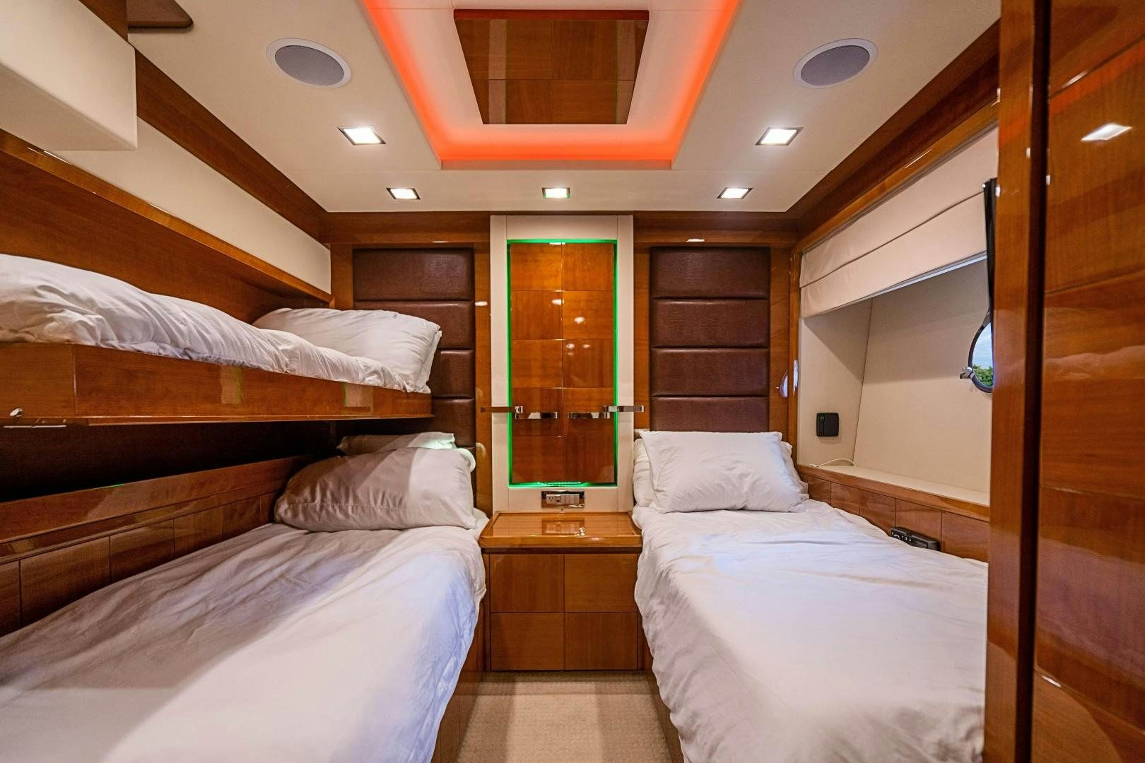 a room with bunk beds aboard Blue Yacht for Sale