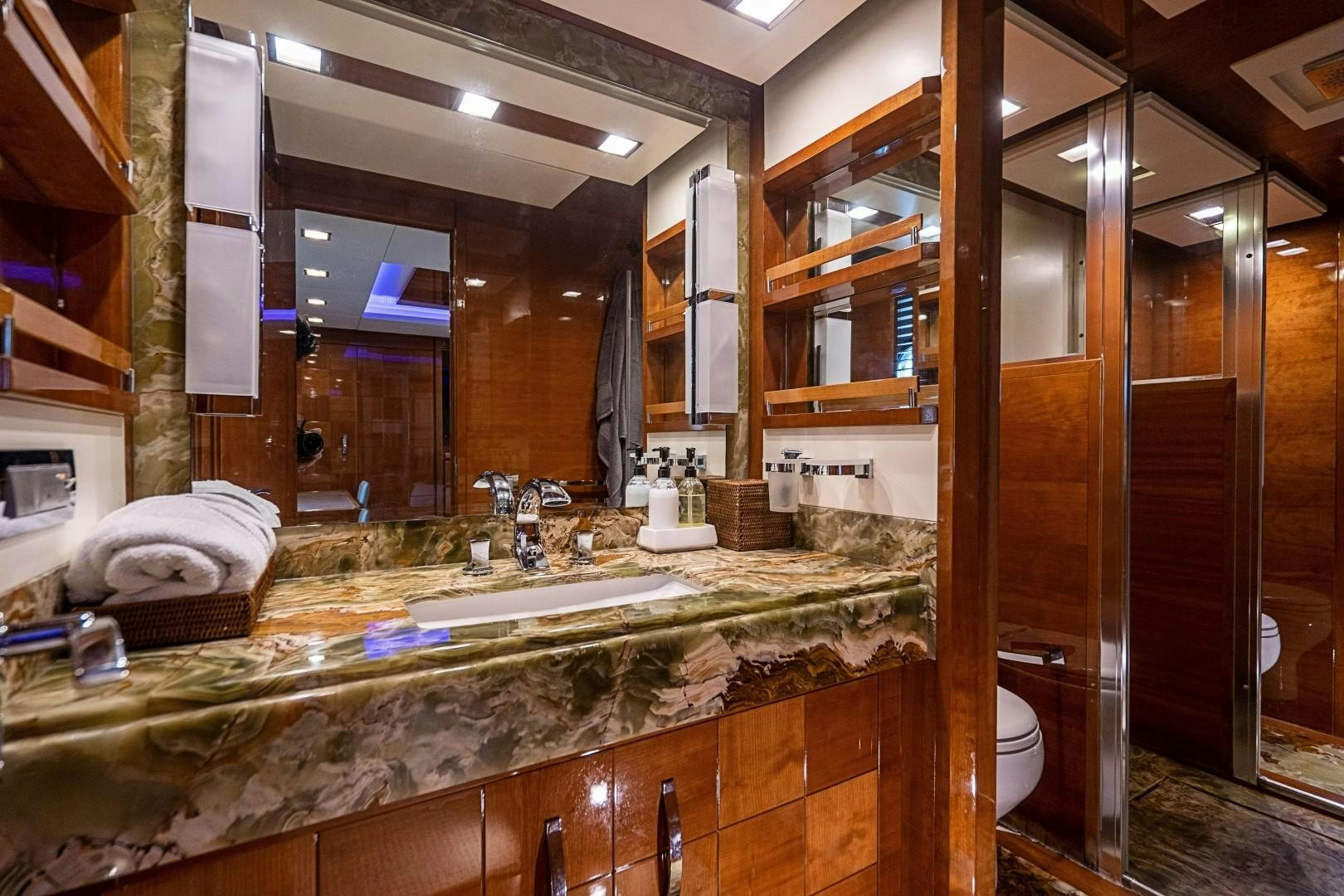 a bathroom with a large countertop aboard Blue Yacht for Sale