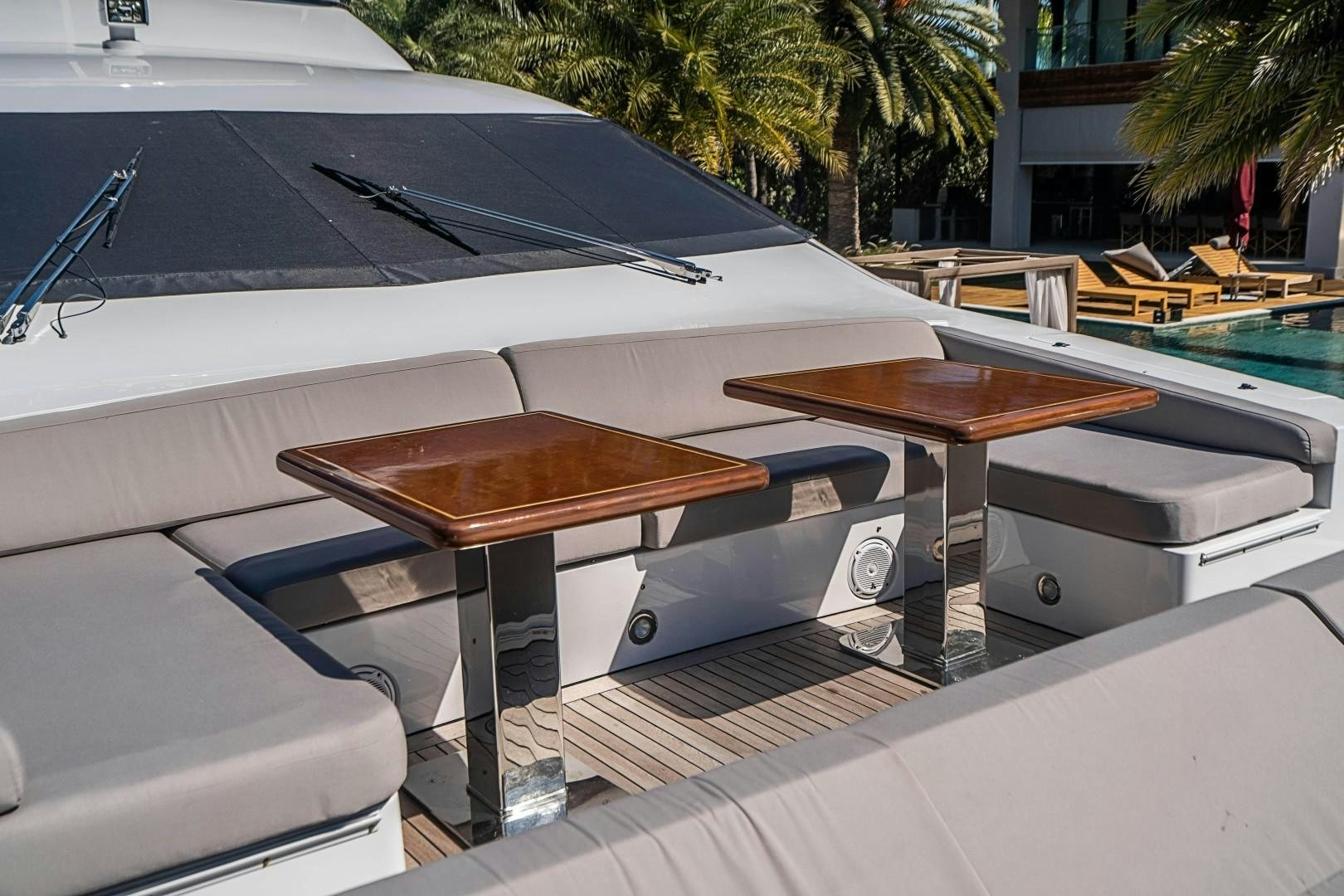 a pool table with a glass top aboard Blue Yacht for Sale