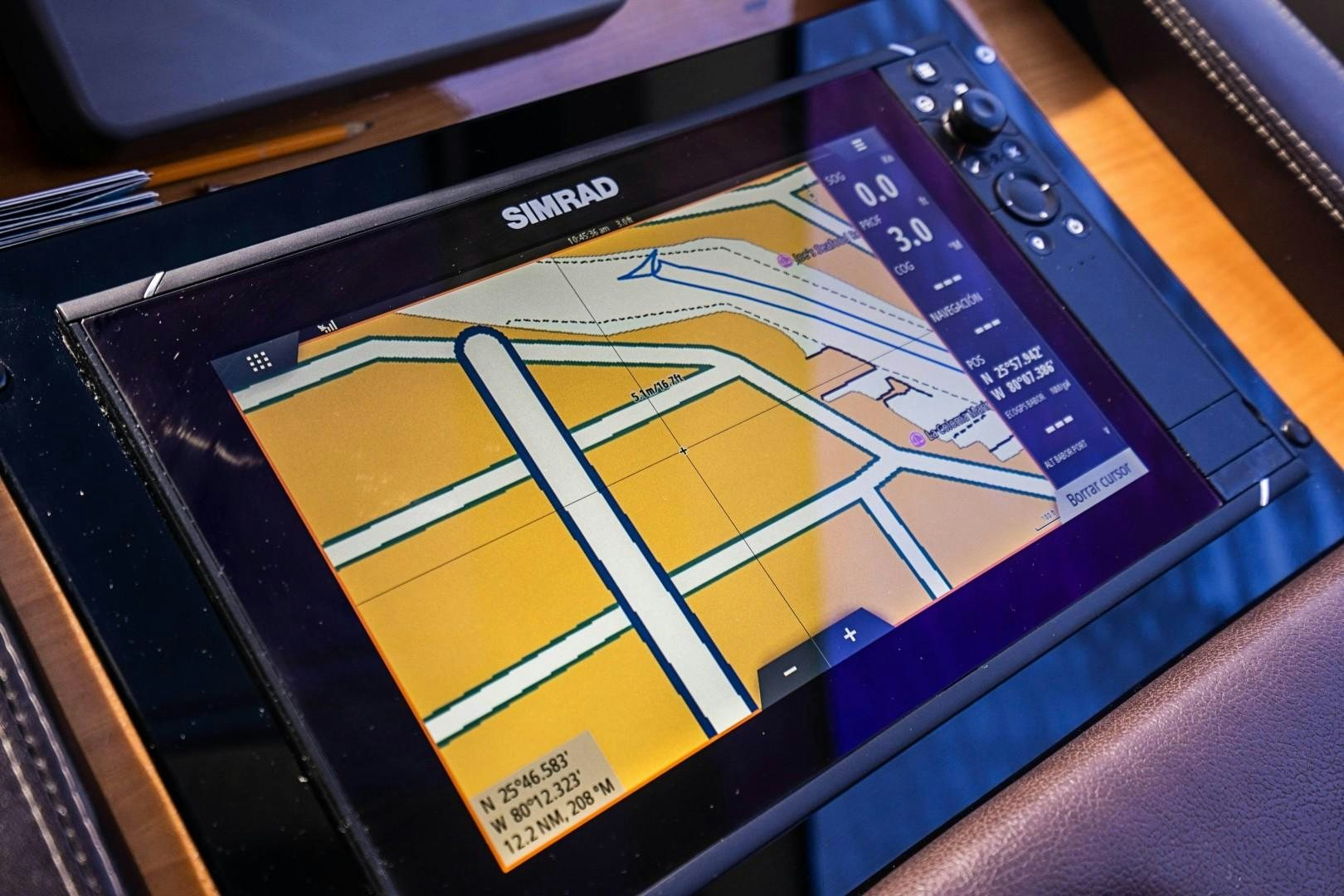 a blue and yellow electronic device aboard Blue Yacht for Sale