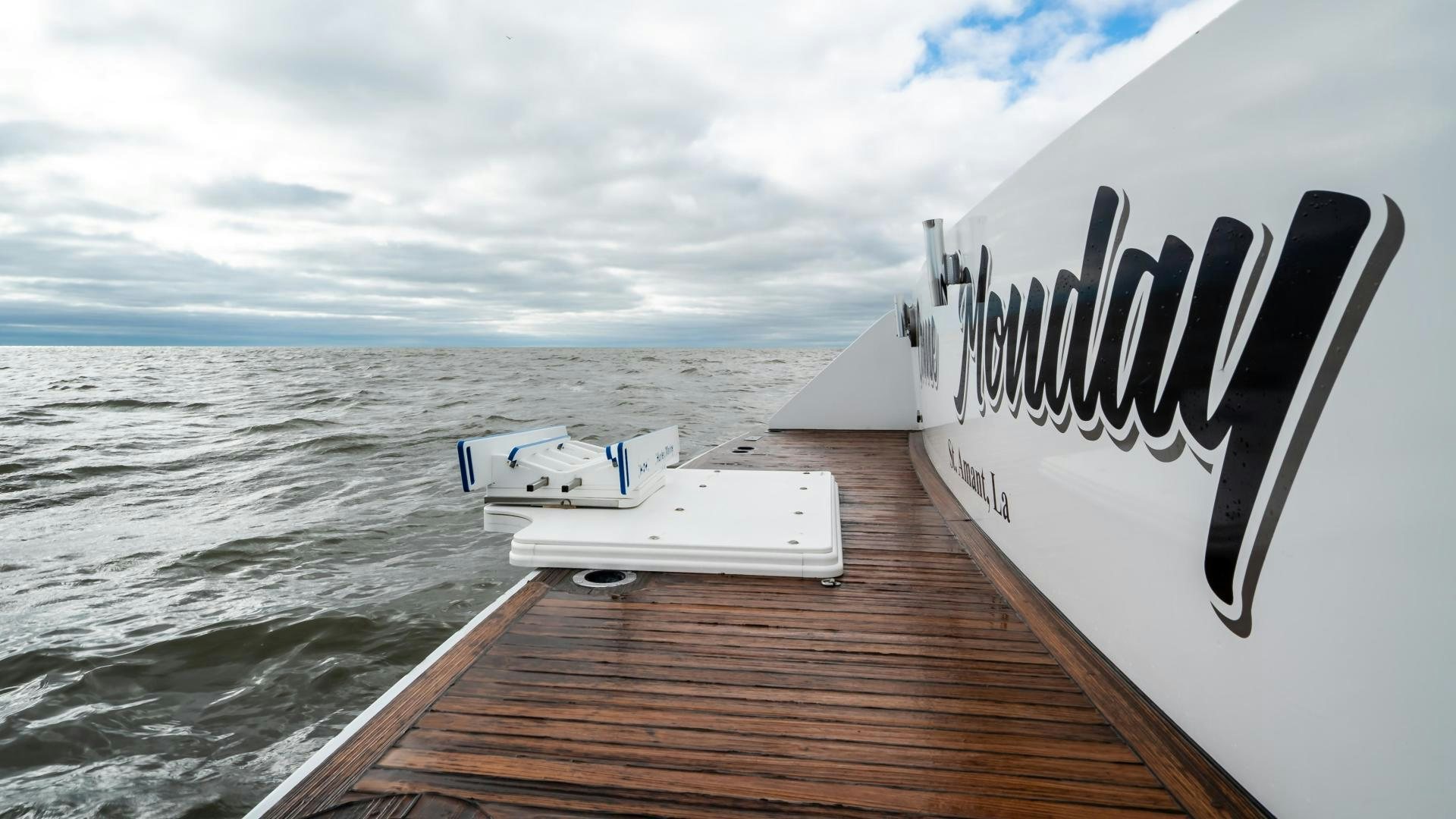 a boat on a body of water aboard COME MONDAY Yacht for Sale