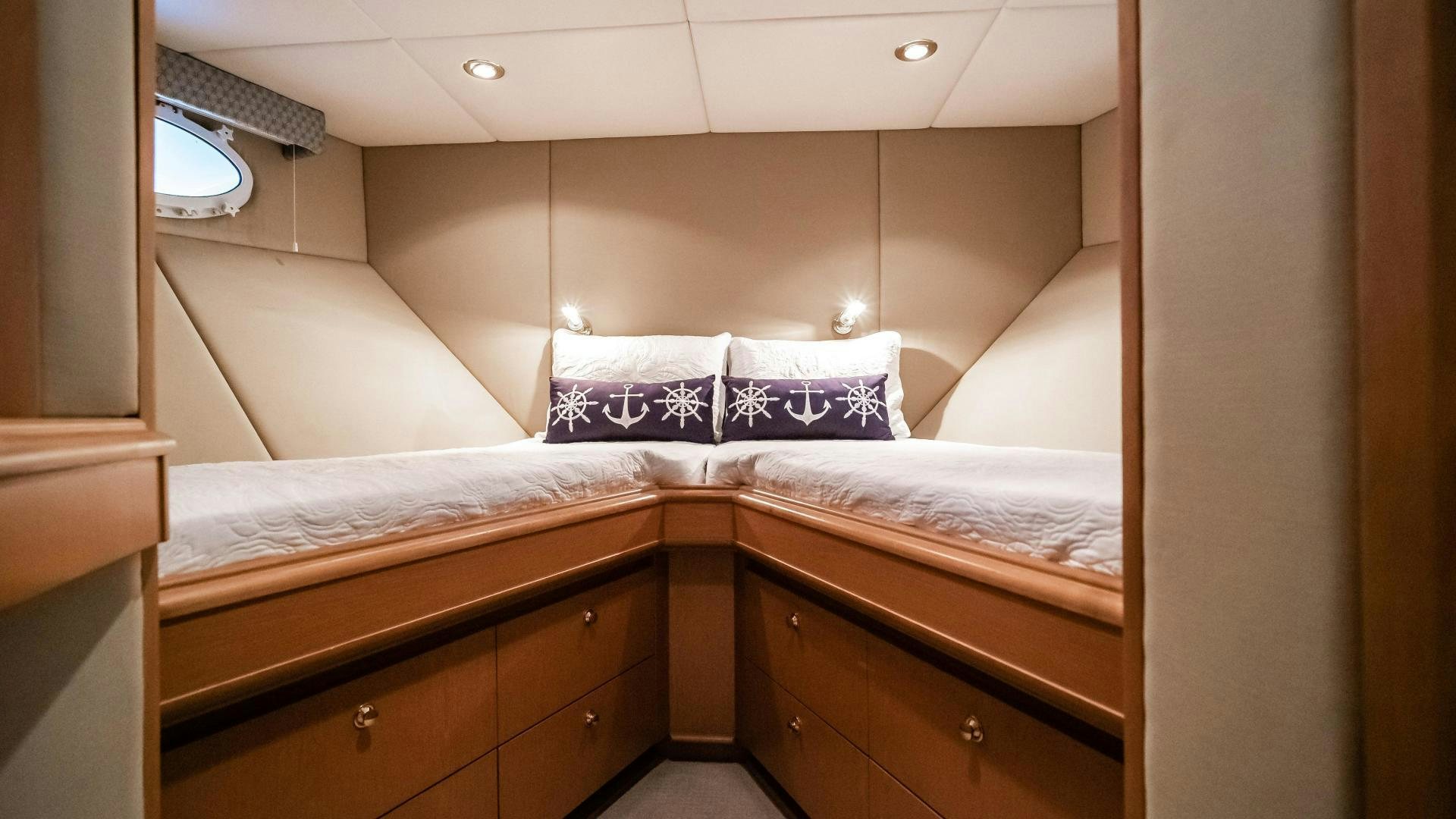 a bed with white sheets aboard COME MONDAY Yacht for Sale