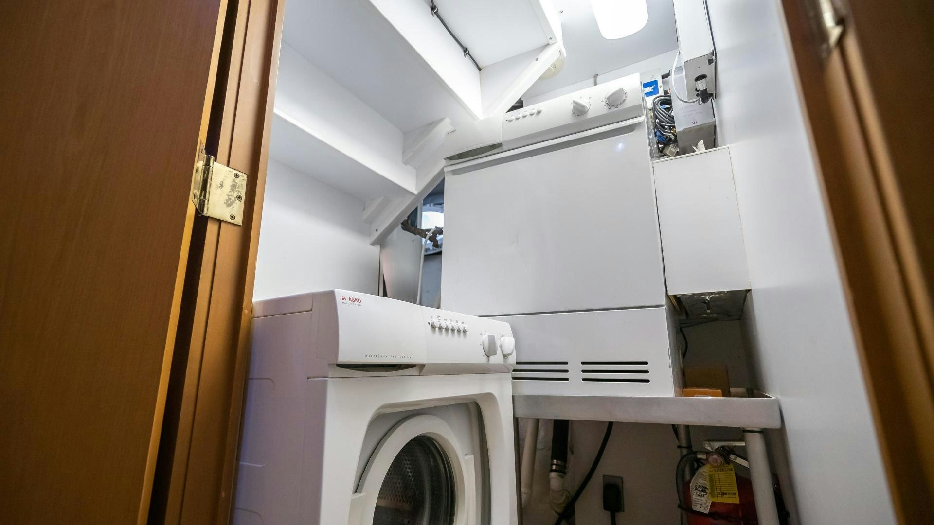 a washing machine in a room aboard COME MONDAY Yacht for Sale