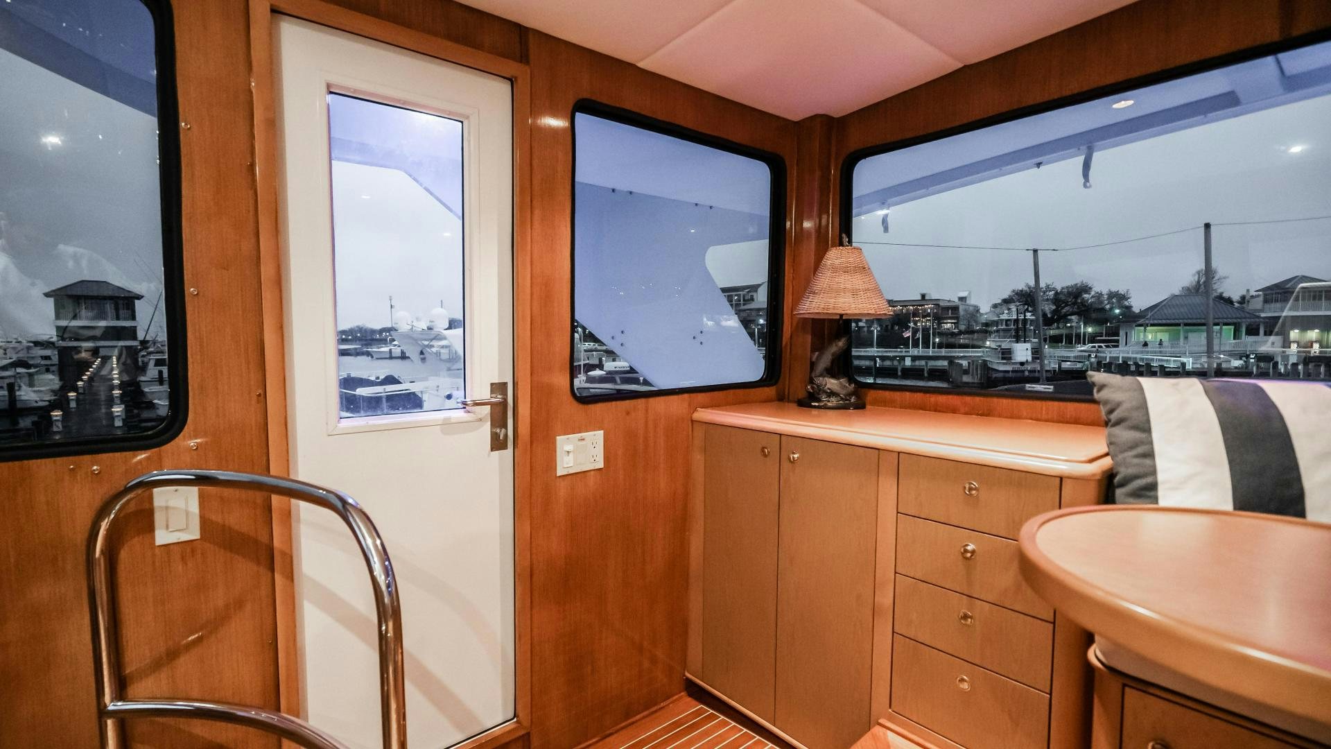 a room with a window and a desk with a tv on it aboard COME MONDAY Yacht for Sale